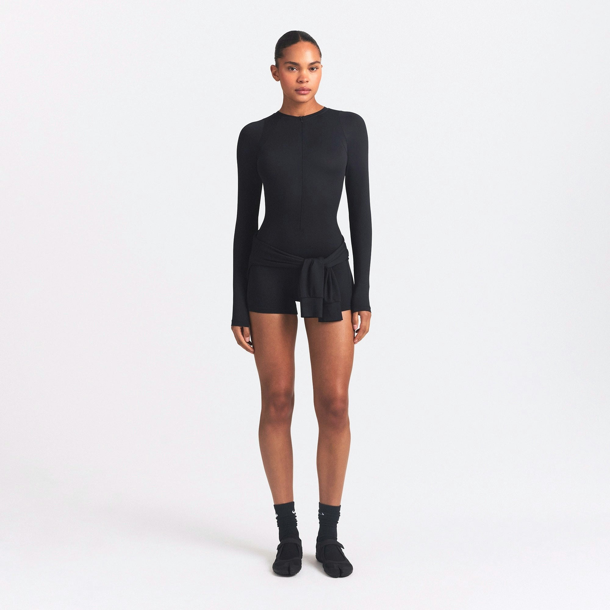 NikeSKIMS AIRY CREWNECK LONG SLEEVE ONE PIECE | OBSIDIAN ON A MODEL FRONT VIEW @ | FOCUS: 0.0, 1.0, 0.9