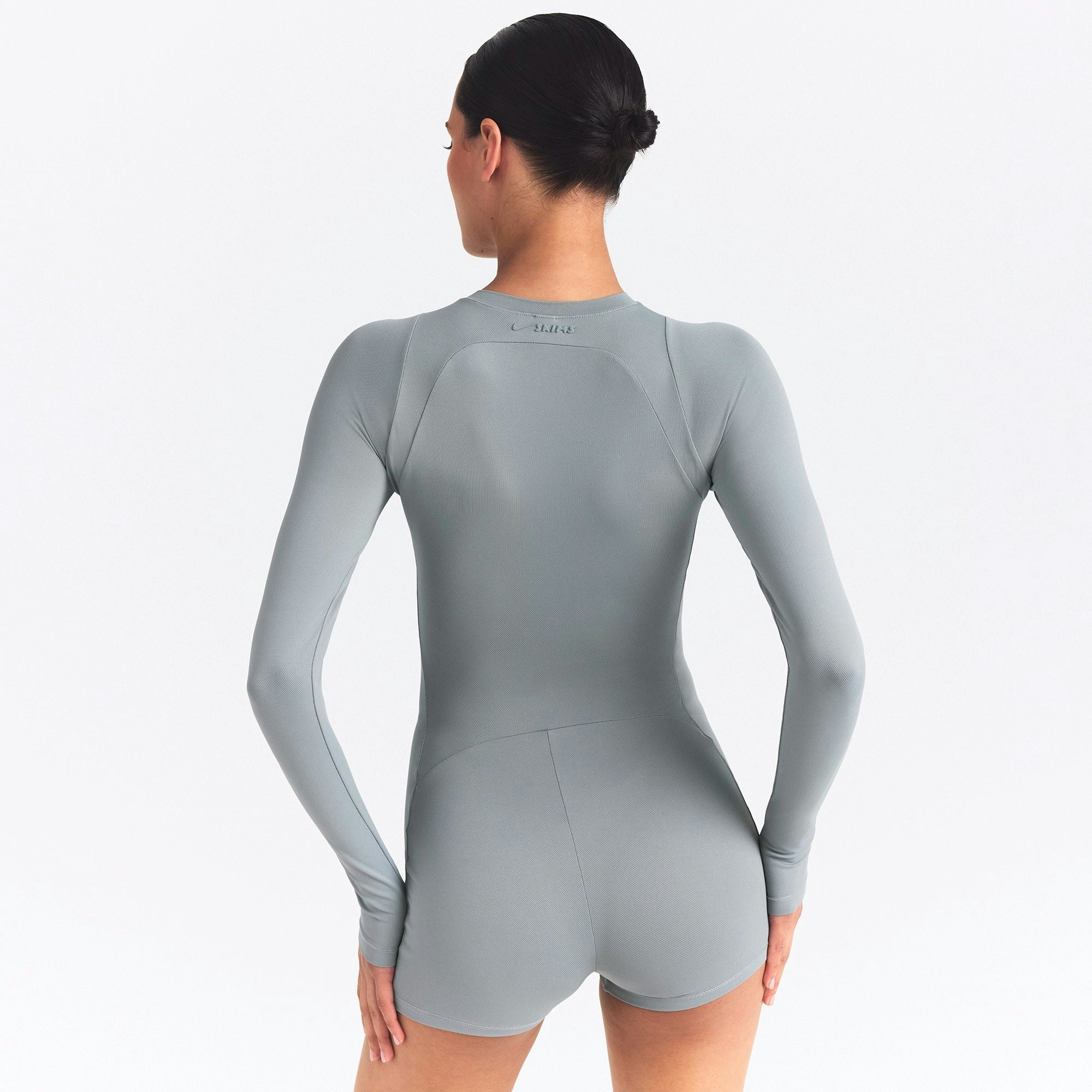 NikeSKIMS AIRY CREWNECK LONG SLEEVE ONE PIECE | WASHED PACIFIC ON A MODEL SIDE VIEW @ | FOCUS: 0.0, 1.0, 0.9