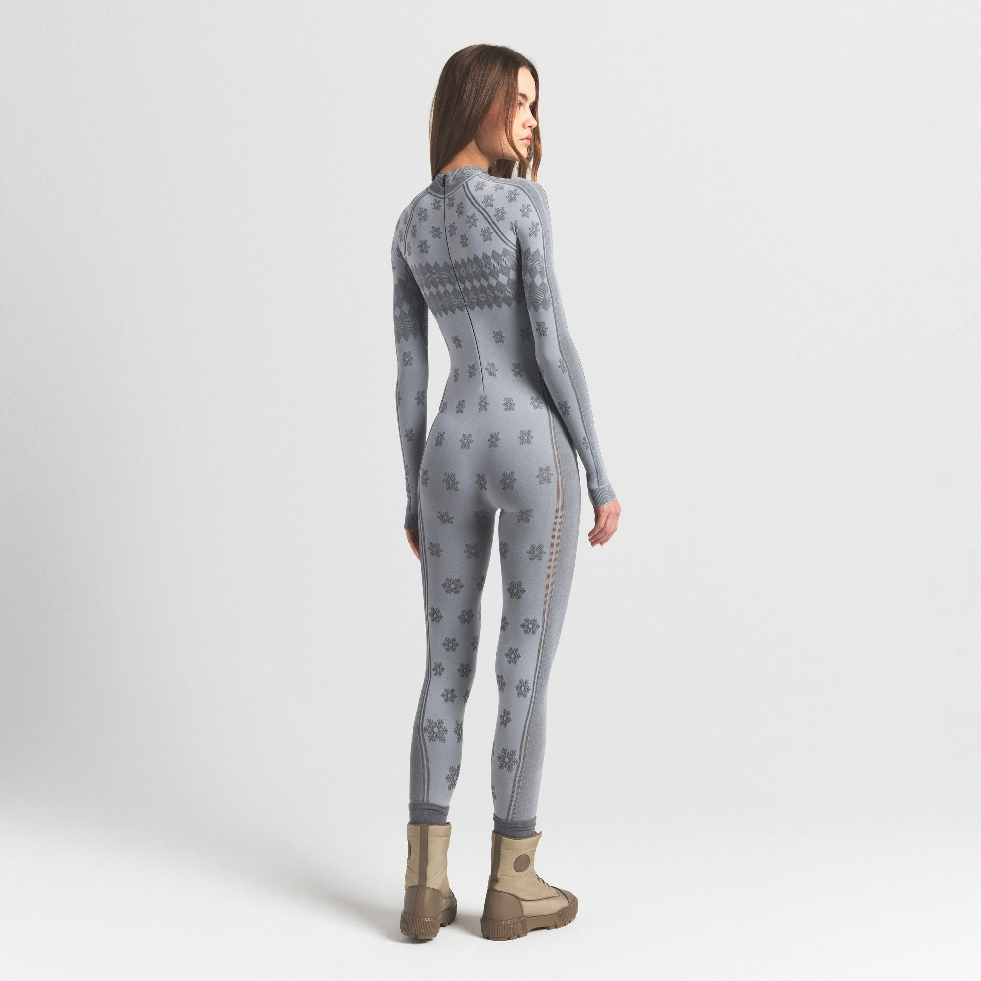 SKIMS FIRST LAYERS TURTLENECK CATSUIT | MIRROR WINTER FAIR ISLE ON A MODEL SIDE VIEW @ | FOCUS: 0.0, 1.0, 0.9