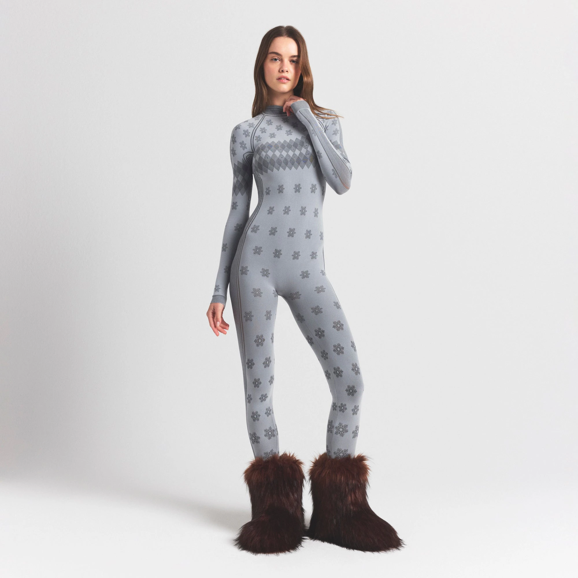 SKIMS FIRST LAYERS TURTLENECK CATSUIT | MIRROR WINTER FAIR ISLE ON A MODEL FRONT VIEW @ | FOCUS: 0.0, 1.0, 0.9