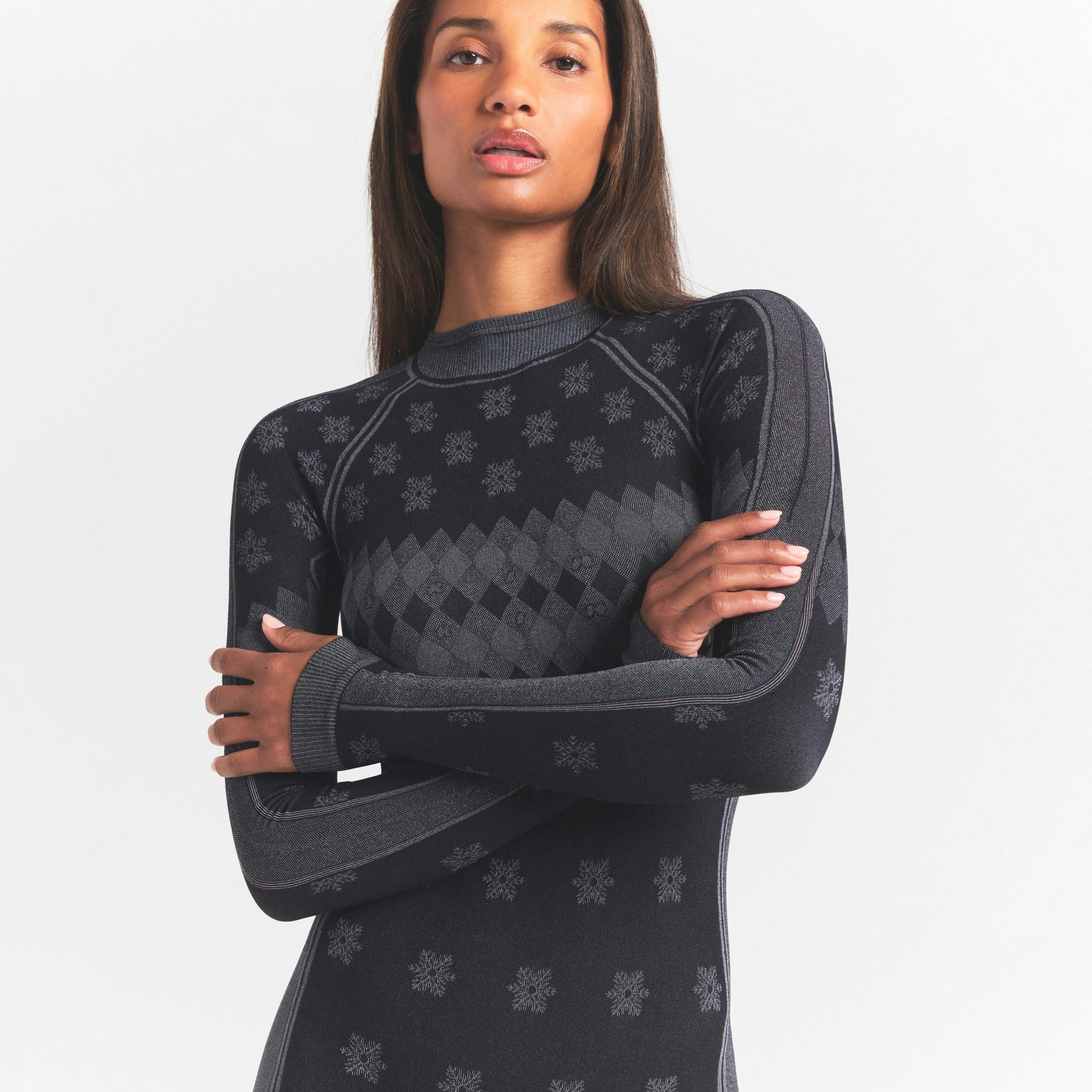 SKIMS FIRST LAYERS TURTLENECK CATSUIT | OBSIDIAN WINTER FAIR ISLE ON A MODEL SIDE VIEW @ | FOCUS: 0.0, 1.0, 0.9