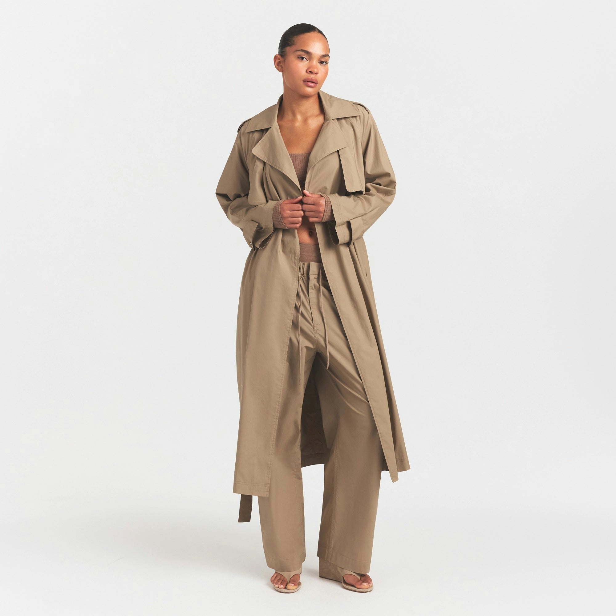 WOVEN COTTON OVERSIZED TRENCH COAT | DESERT ON A MODEL FRONT VIEW @ | FOCUS: 0.0, 1.0, 0.9