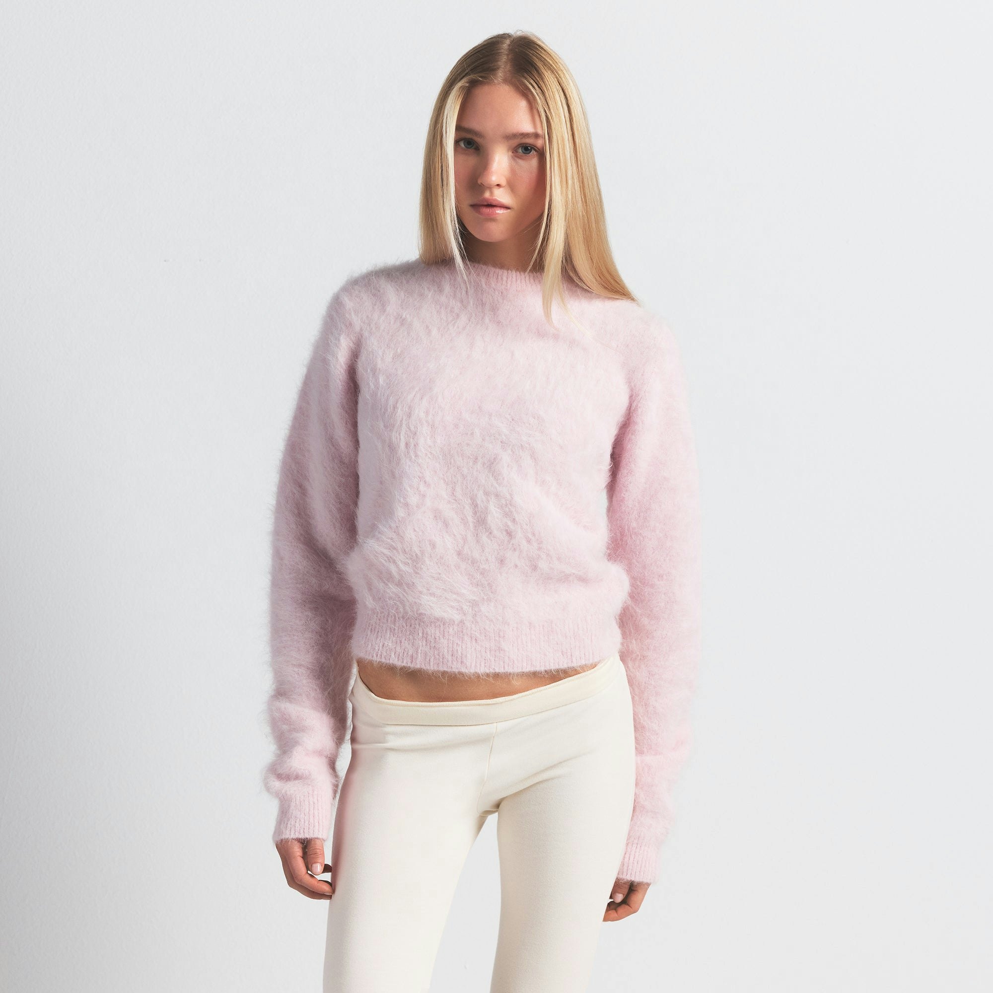 BRUSHED ALPACA CREWNECK SWEATER | CHERRY BLOSSOM ON A MODEL FRONT VIEW @ | FOCUS: 0.0, 1.0, 0.9