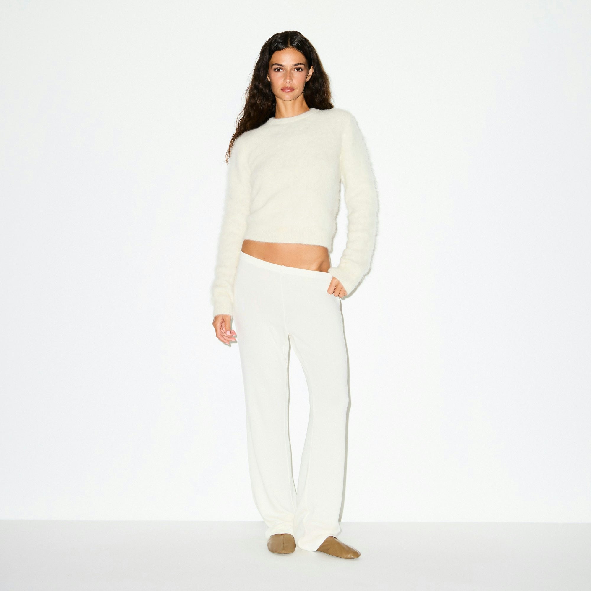 BRUSHED ALPACA CREWNECK SWEATER | EGRET ON A MODEL FRONT VIEW @ | FOCUS: 0.0, 1.0, 0.9