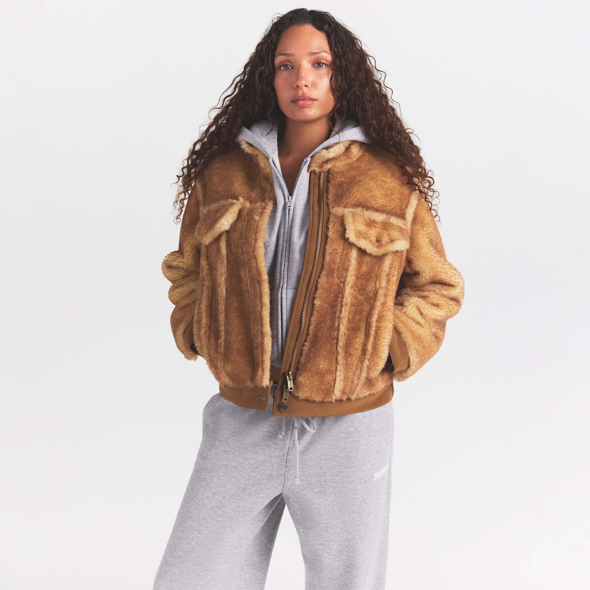 FAUX SHEARLING JACKET | TOASTED LATTE ON A MODEL SIDE VIEW @ | FOCUS: 0.0, 1.0, 0.9