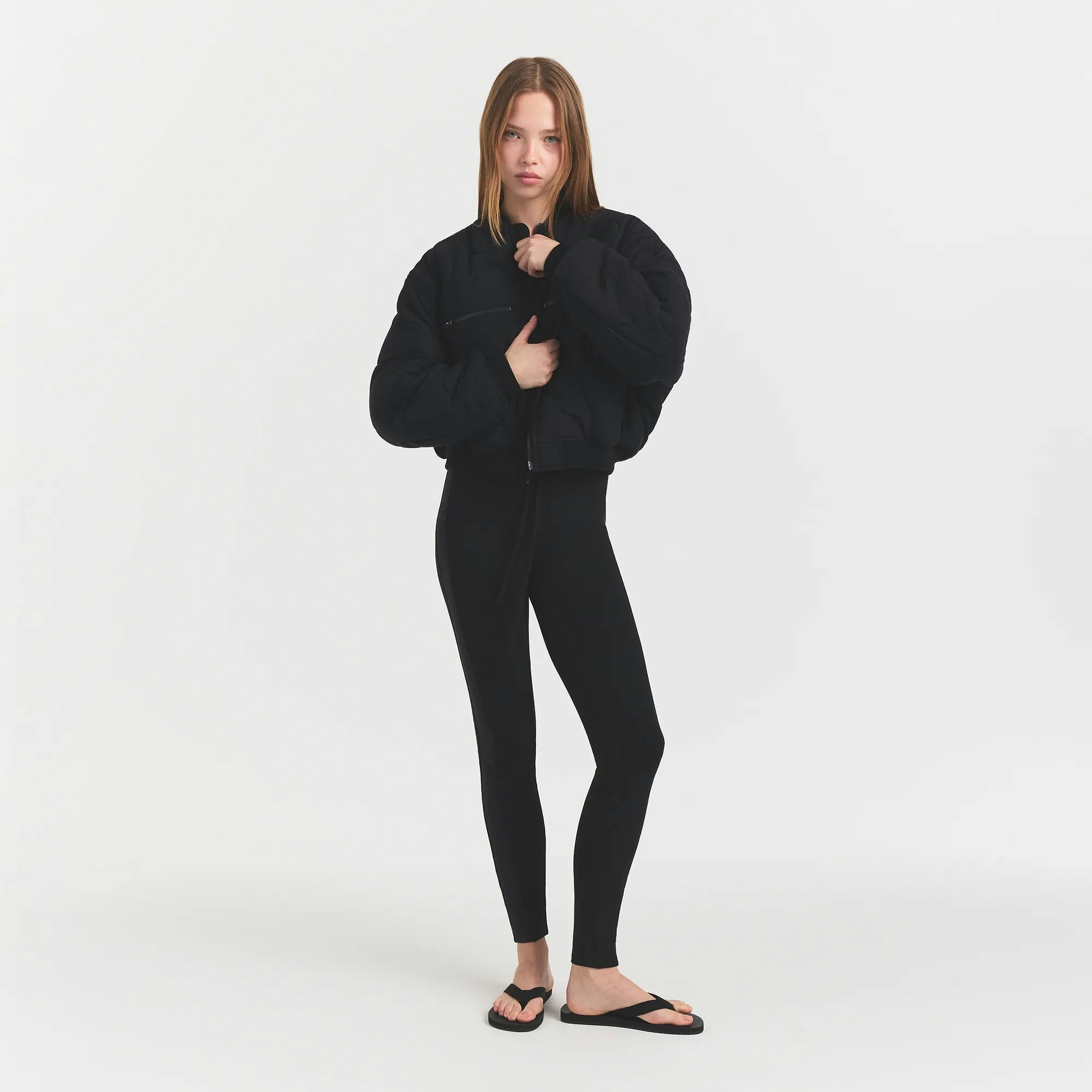 NEOPRENE OUTERWEAR REVERSIBLE BOMBER JACKET | OBSIDIAN ON A MODEL FRONTVIEW @ | FOCUS: 0.0, 1.0, 0.9 