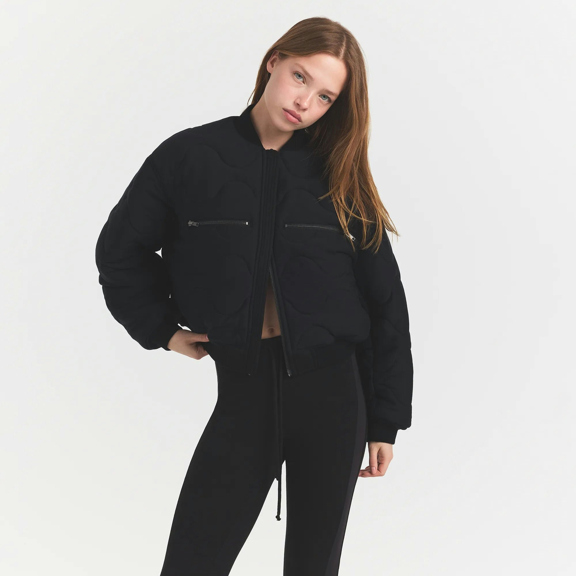 NEOPRENE OUTERWEAR REVERSIBLE BOMBER JACKET | OBSIDIAN ON A MODEL FRONTVIEW @ | FOCUS: 0.0, 1.0, 0.9 