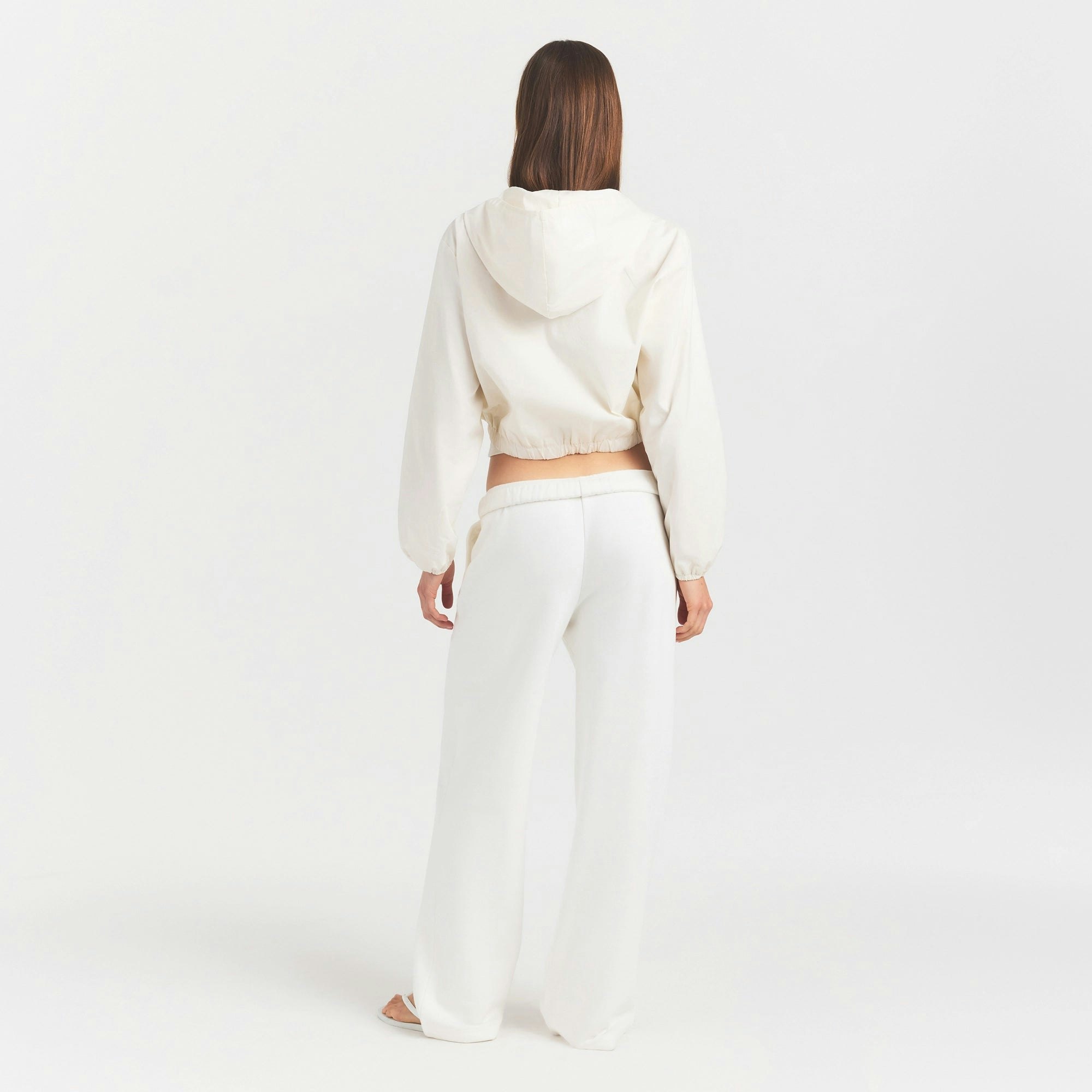 WOVEN COTTON CROPPED ZIP UP JACKET | EGRET ON A MODEL FRONT VIEW @ | FOCUS: 0.0, 1.0, 0.9