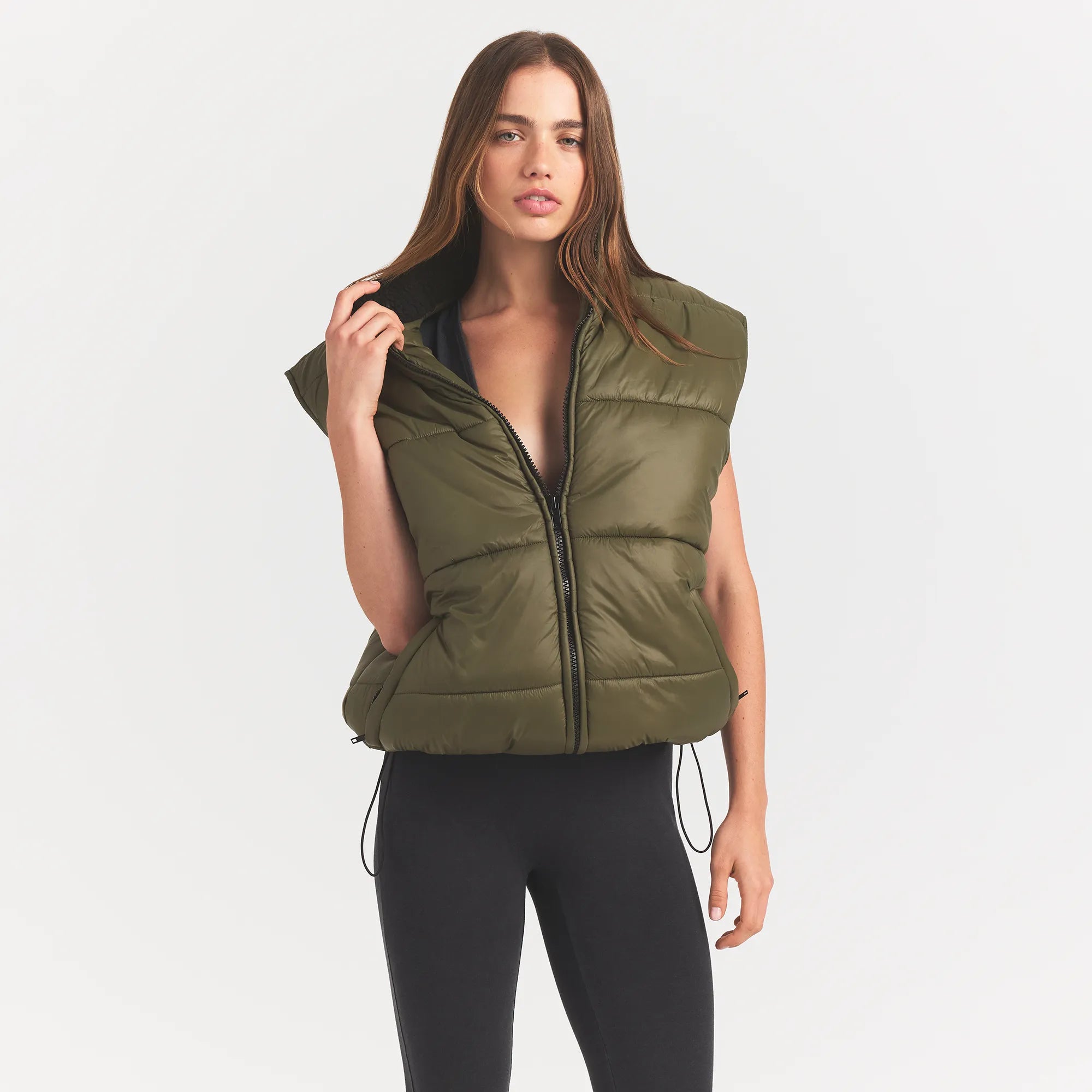 LIGHTWEIGHT PUFFER OVERSIZED VEST | OLIVE ON A MODEL FRONTVIEW @ | FOCUS: 0.0, 1.0, 0.9