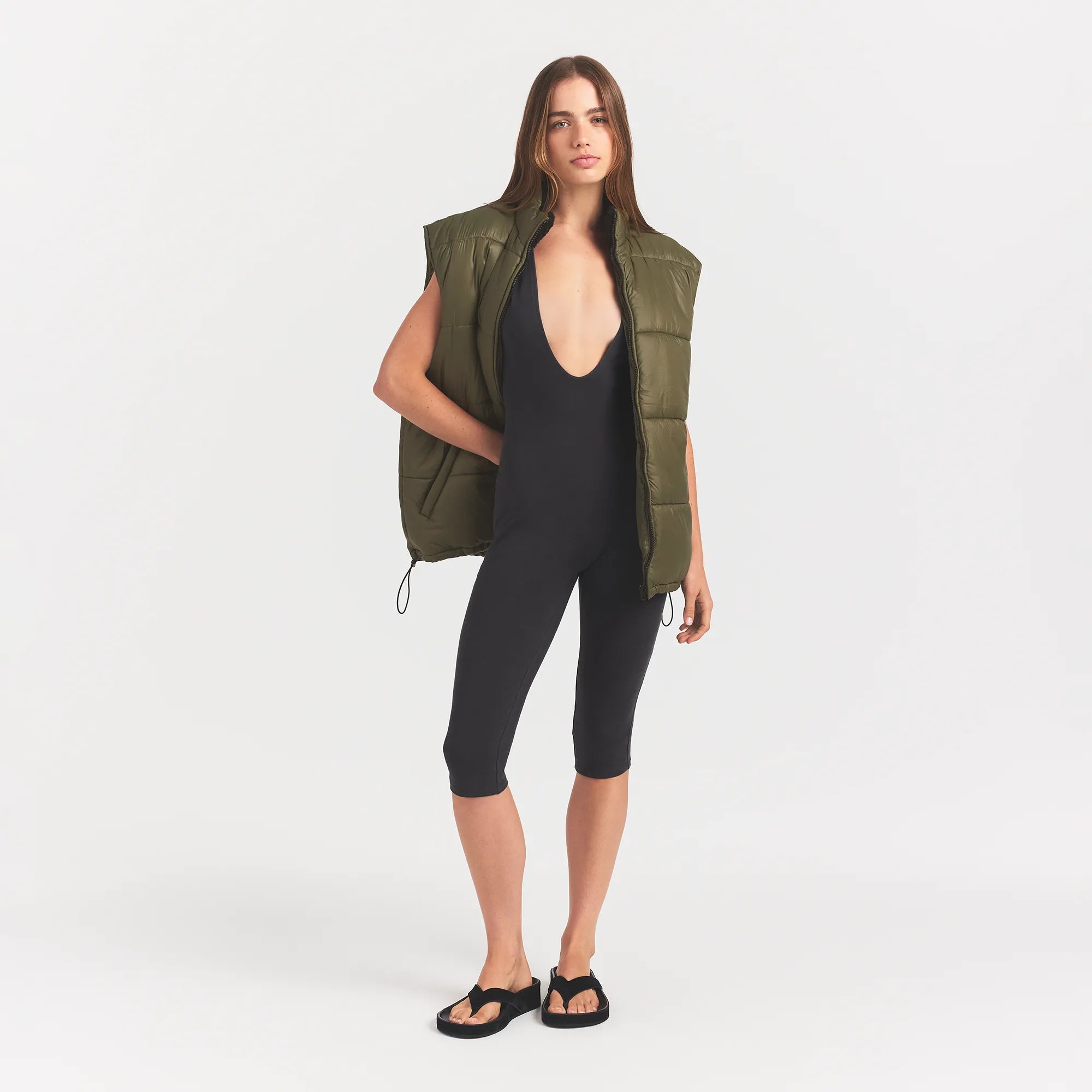 LIGHTWEIGHT PUFFER OVERSIZED VEST | OLIVE ON A MODEL FRONTVIEW @ | FOCUS: 0.0, 1.0, 0.9 