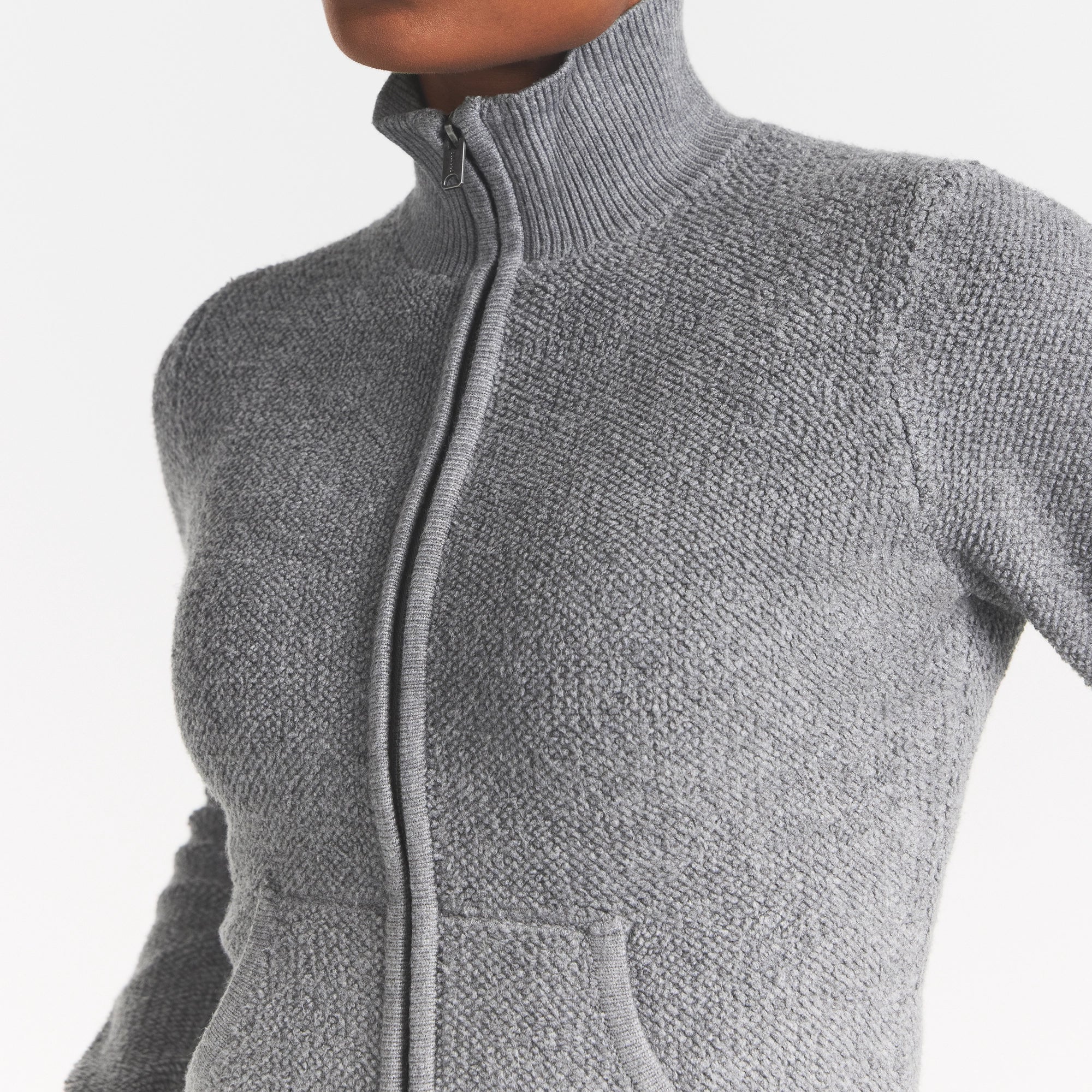 SHERPA KNIT ZIP UP | DARK HEATHER GREY ON A MODEL SIDE VIEW @ | FOCUS: 0.0, 1.0, 0.9