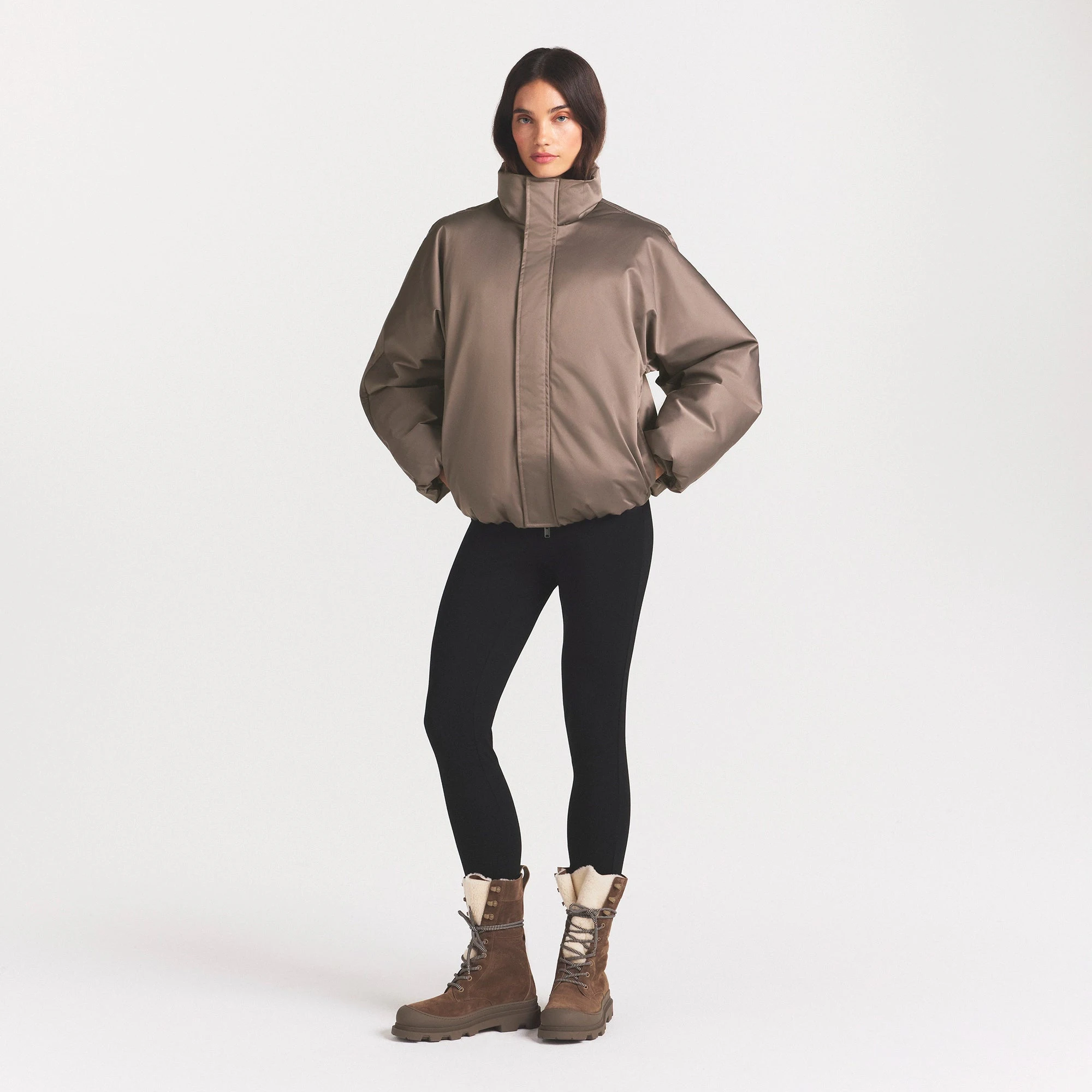 HEAVYWEIGHT NYLON PUFFER JACKET | MINK & LAYS FLAT ON A WHITE BACKGROUND | FLT @ | FOCUS: 0.0, 1.0, 0.9