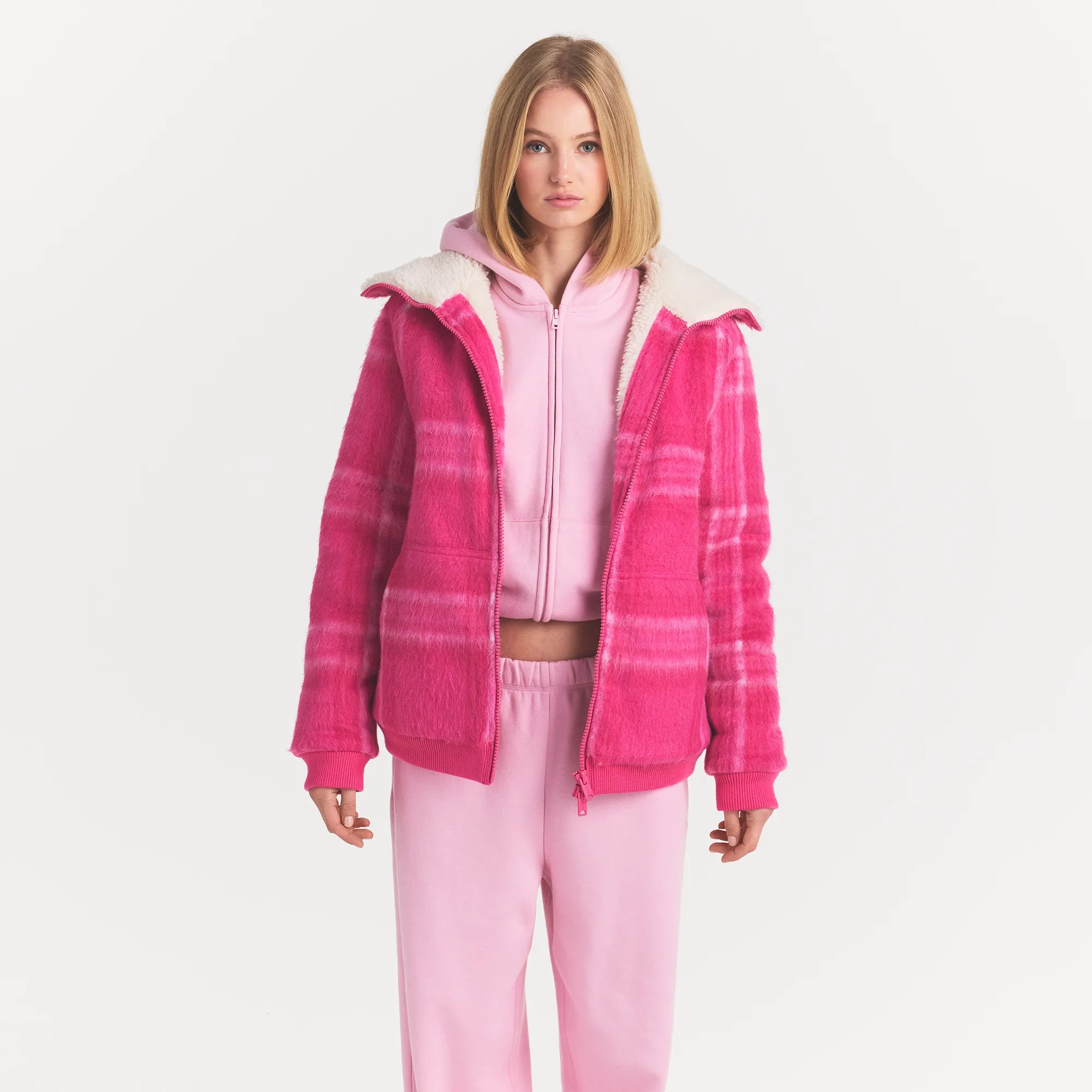 TEXTURED KNIT BRUSHED PLAID FLEECE ZIP UP | HOT PINK PITAYA TARTAN ON A MODEL FRONT VIEW @ | FOCUS: 0.0, 1.0, 0.9
