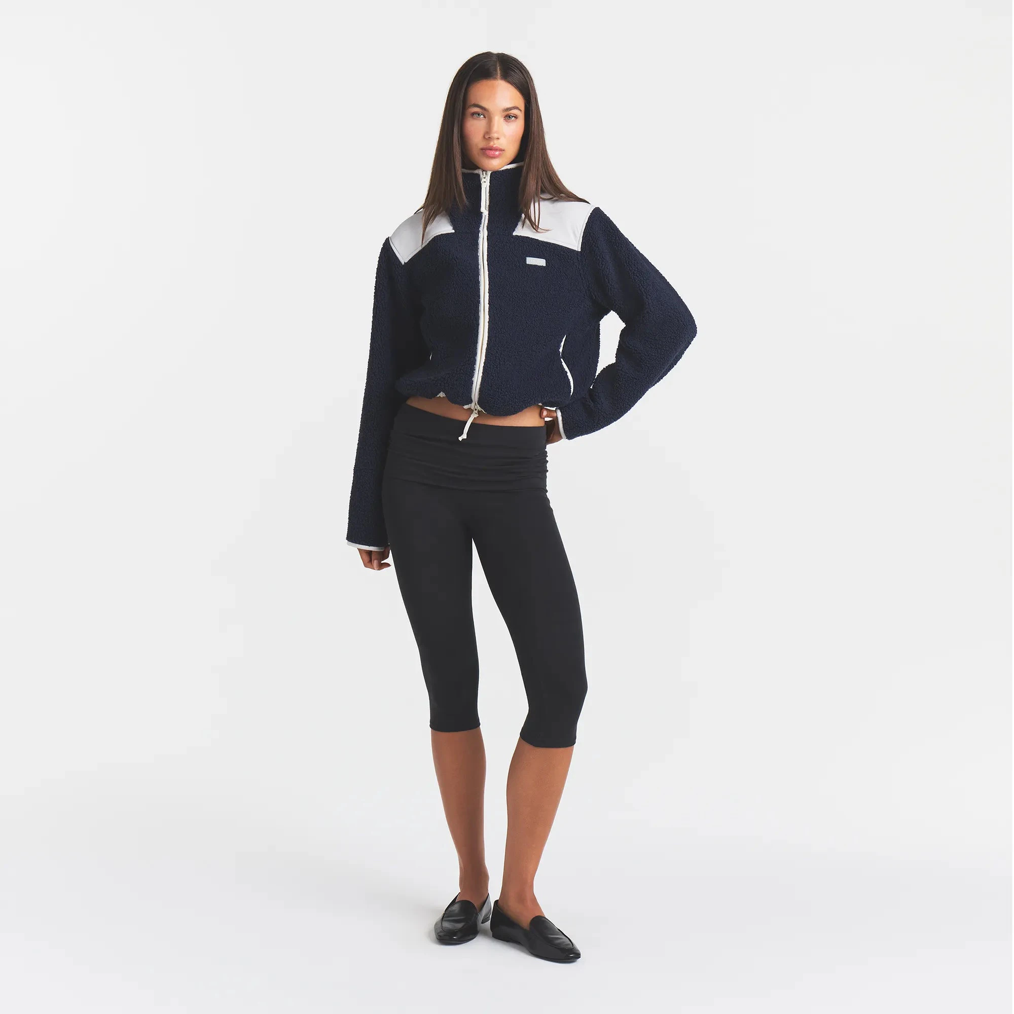 TEDDY BOXY ZIP UP JACKET | NAVY & LAYS FLAT ON A WHITE BACKGROUND | FLT