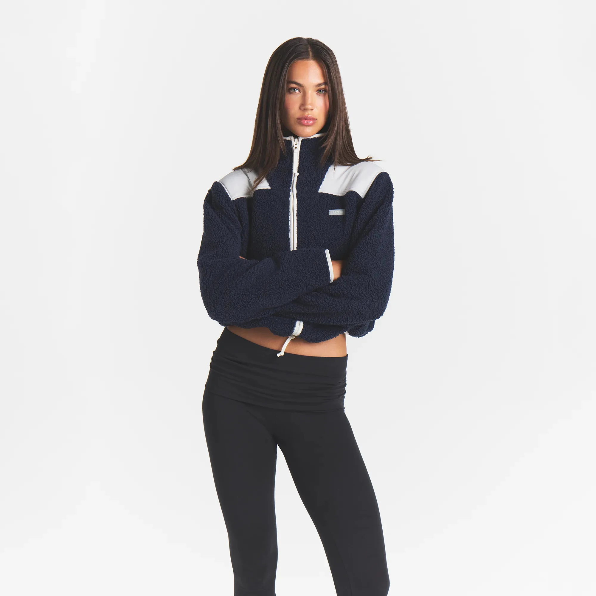 TEDDY BOXY ZIP UP JACKET | NAVY & LAYS FLAT ON A WHITE BACKGROUND | FLT
