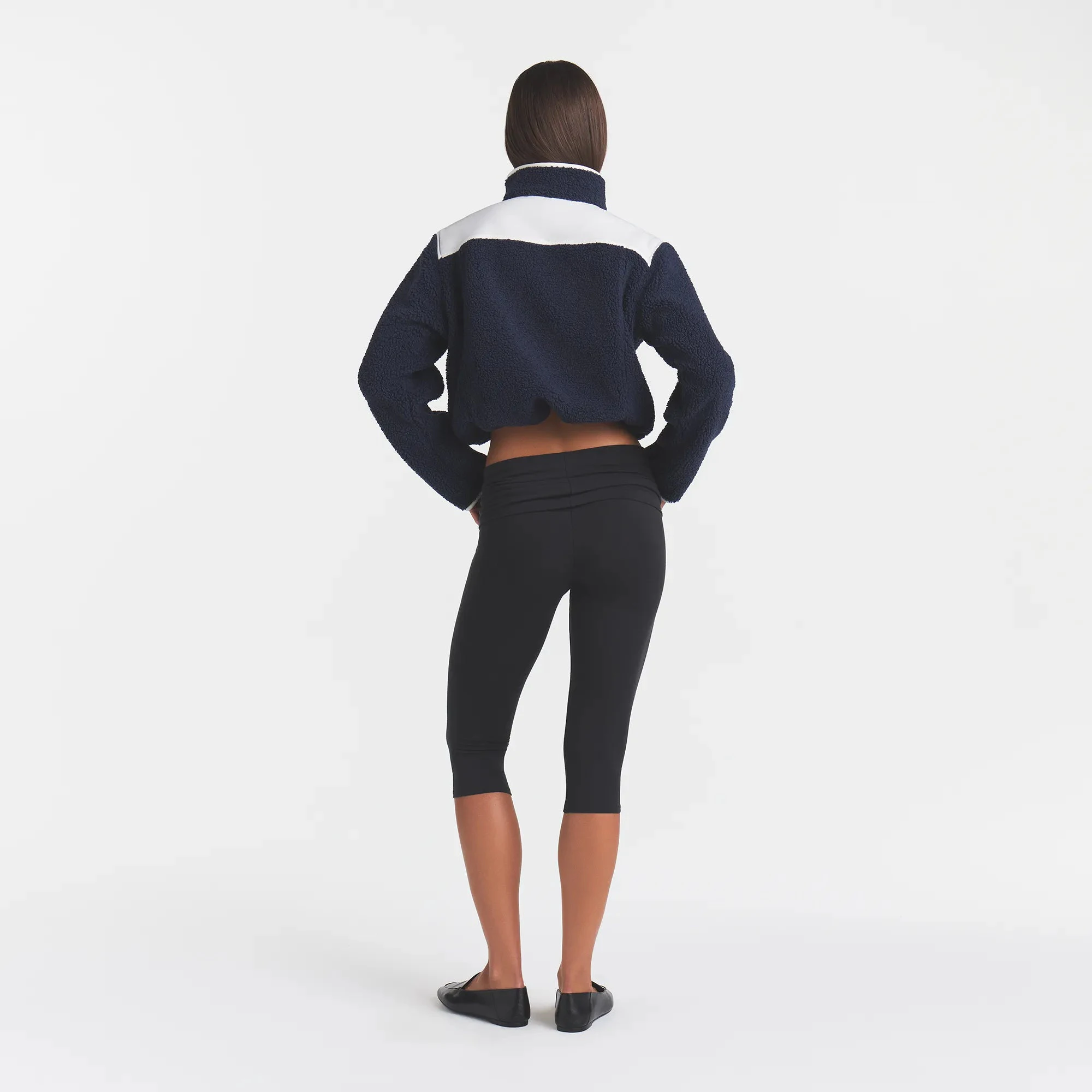 TEDDY BOXY ZIP UP JACKET | NAVY & LAYS FLAT ON A WHITE BACKGROUND | FLT