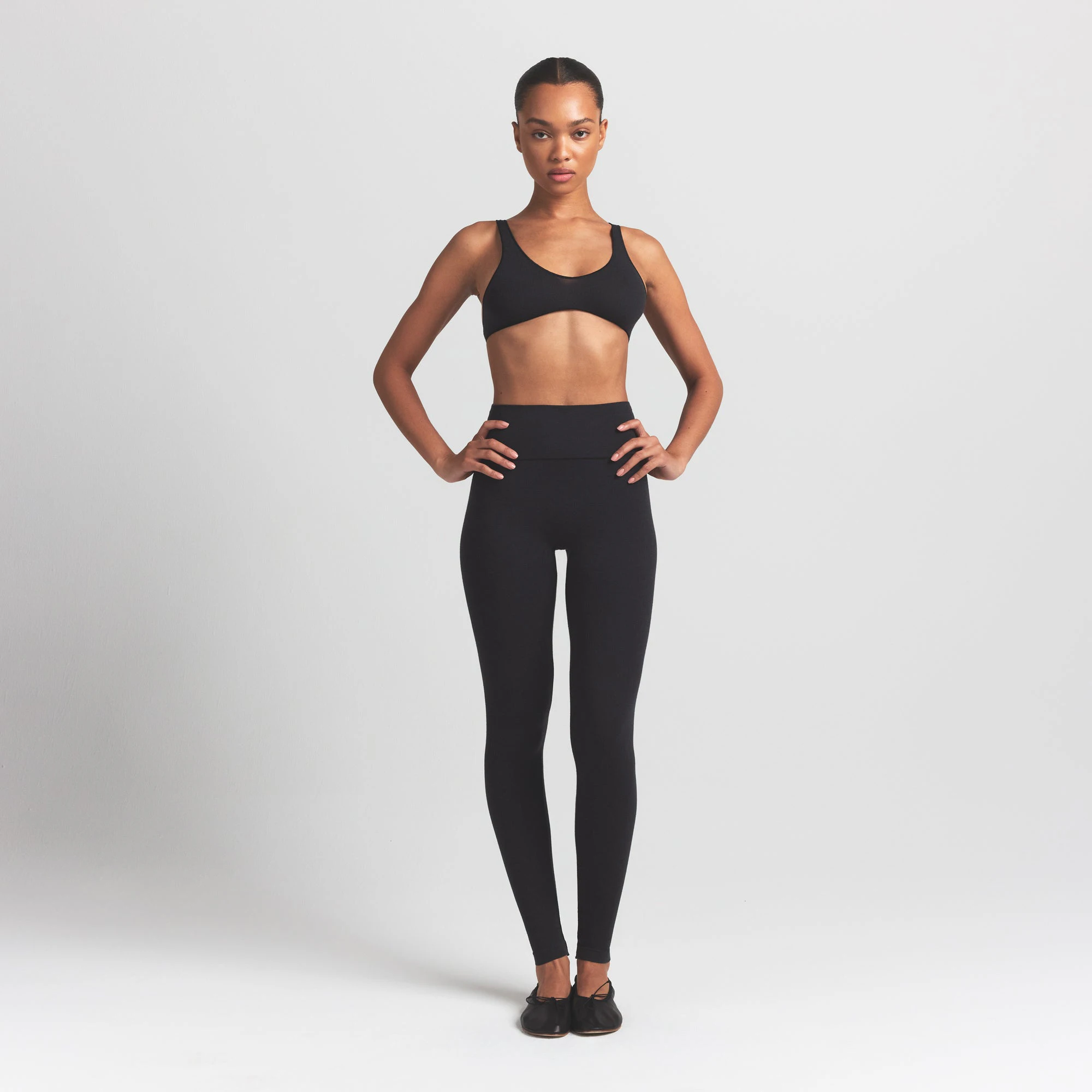 WOOL RIB BRALETTE | OBSIDIAN ON A MODEL FRONT VIEW S | FOCUS: 0.0, 1.0, 0.9