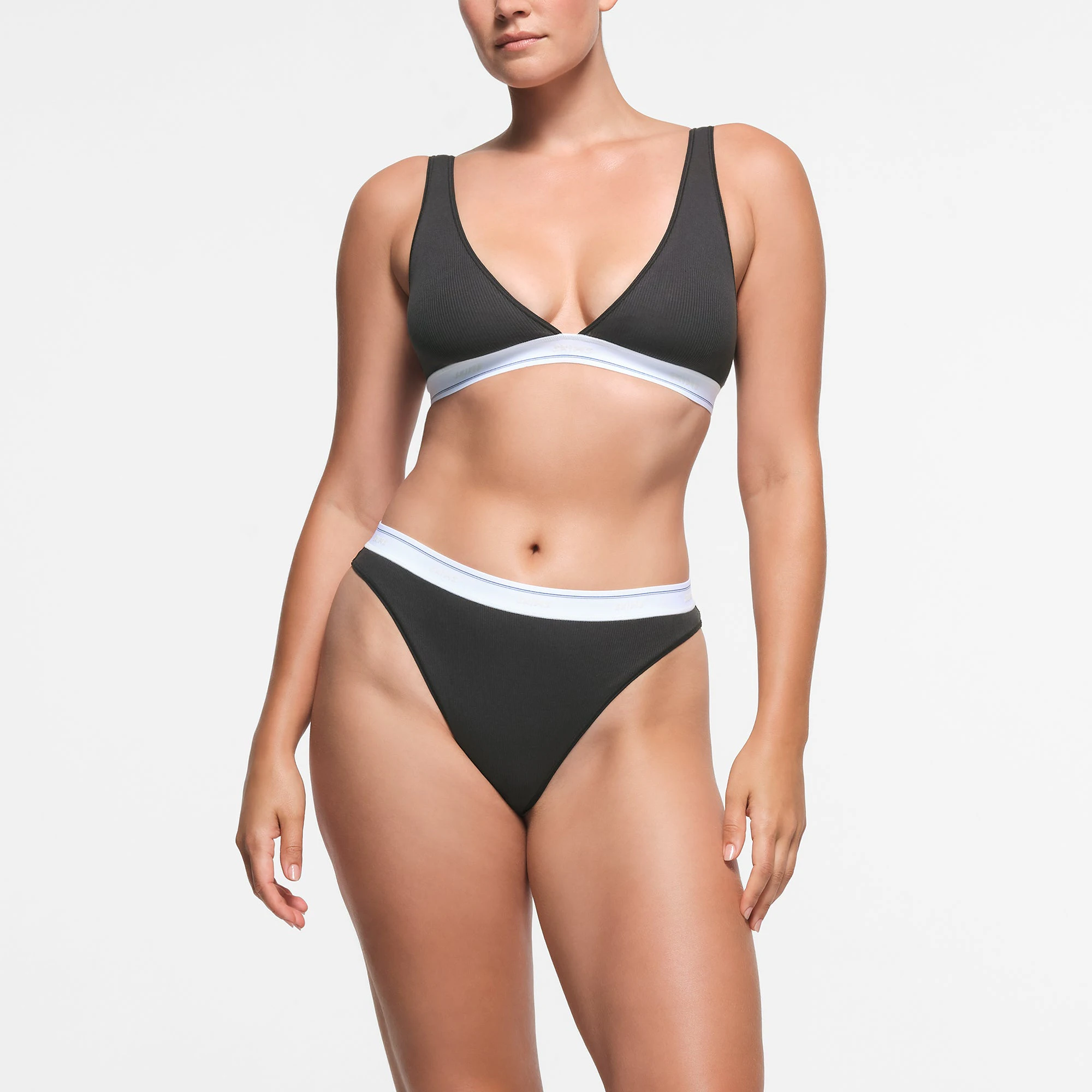 COTTON RIB PLUNGE BRALETTE | SOOT SPORT STRIPE ON A MODEL FRONT VIEW
