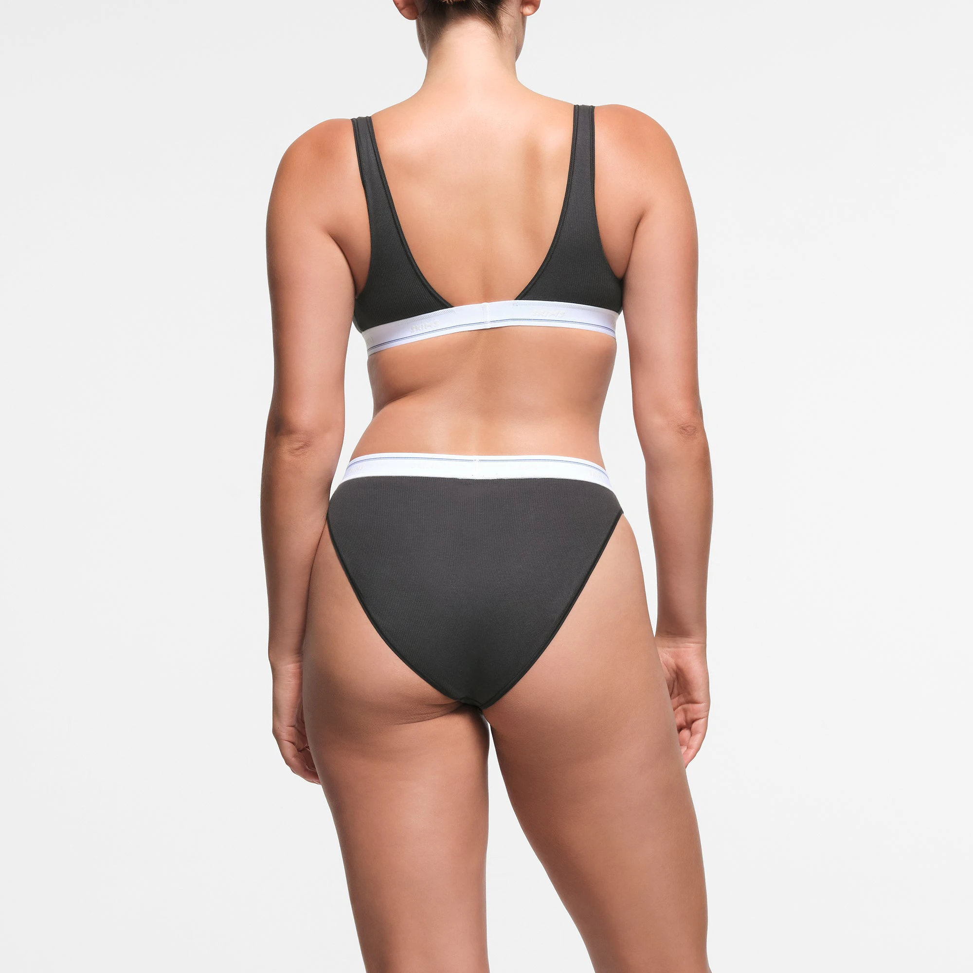 COTTON RIB PLUNGE BRALETTE | SOOT SPORT STRIPE ON A MODEL BACK VIEW
