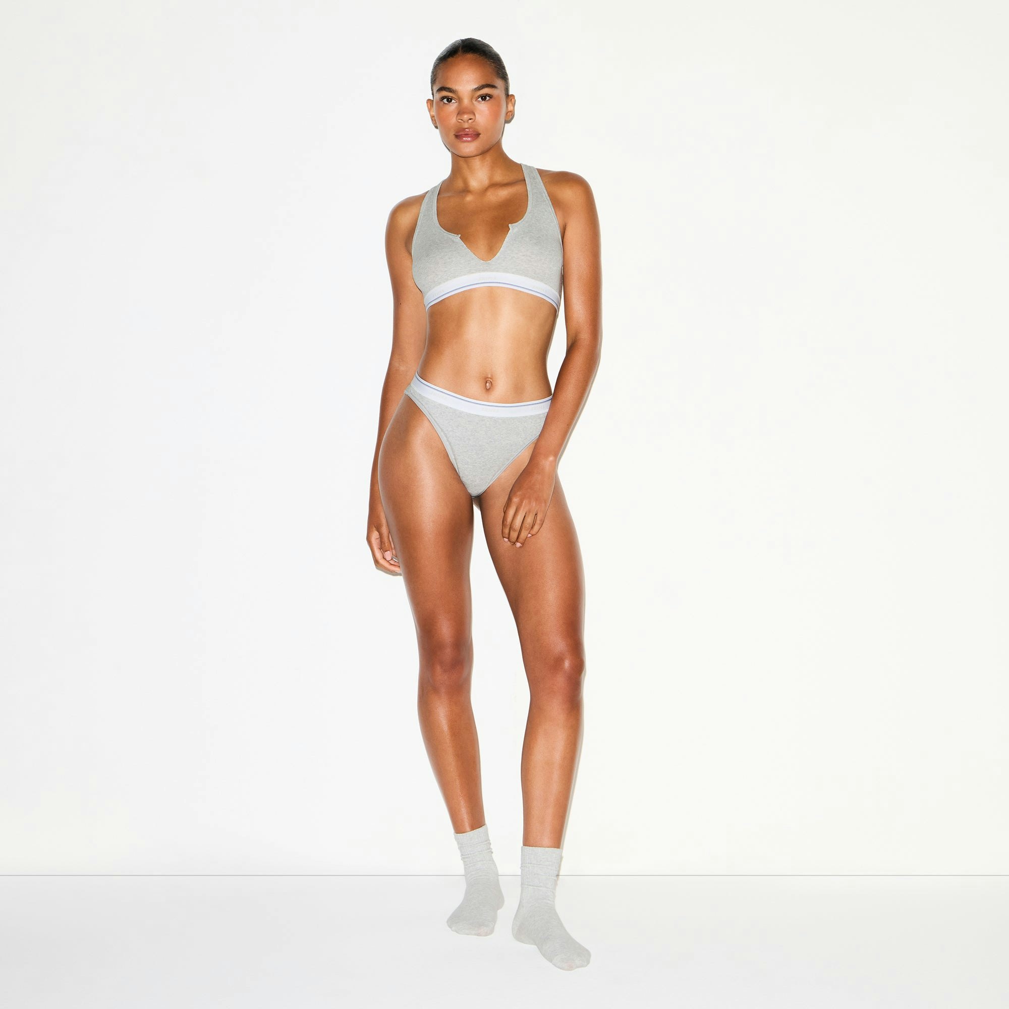COTTON RIB SPLIT NECK BRALETTE | LIGHT HEATHER GREY STRIPE ON A MODEL FRONT VIEW @ | FOCUS: 0.0, 1.0, 0.9