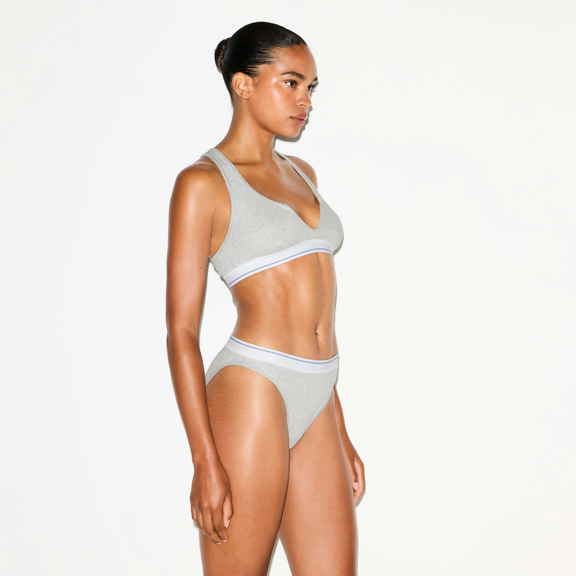 COTTON RIB SPLIT NECK BRALETTE | LIGHT HEATHER GREY STRIPE ON A MODEL SIDE VIEW @ | FOCUS: 0.0, 1.0, 0.9