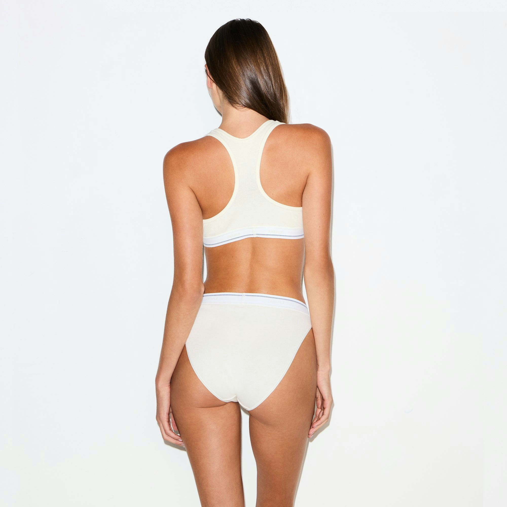 COTTON RIB SPLIT NECK BRALETTE | MARBLE STRIPE ON A MODEL SIDE VIEW @ | FOCUS: 0.0, 1.0, 0.9
