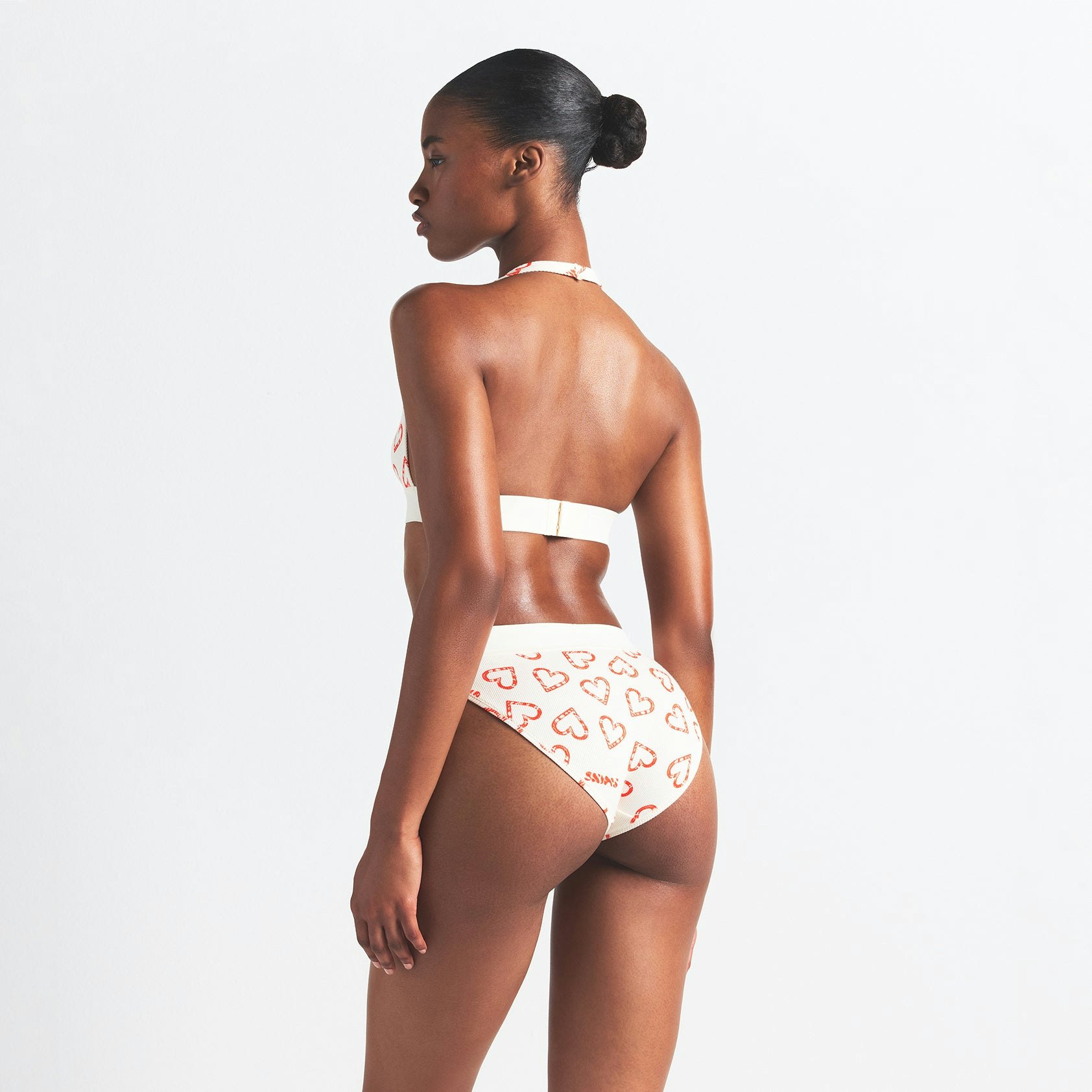 COTTON RIB HALTER BRALETTE | MARBLE CANDY HEART PRINT ON A MODEL BACK VIEW @ | FOCUS: 0.0, 1.0, 0.9