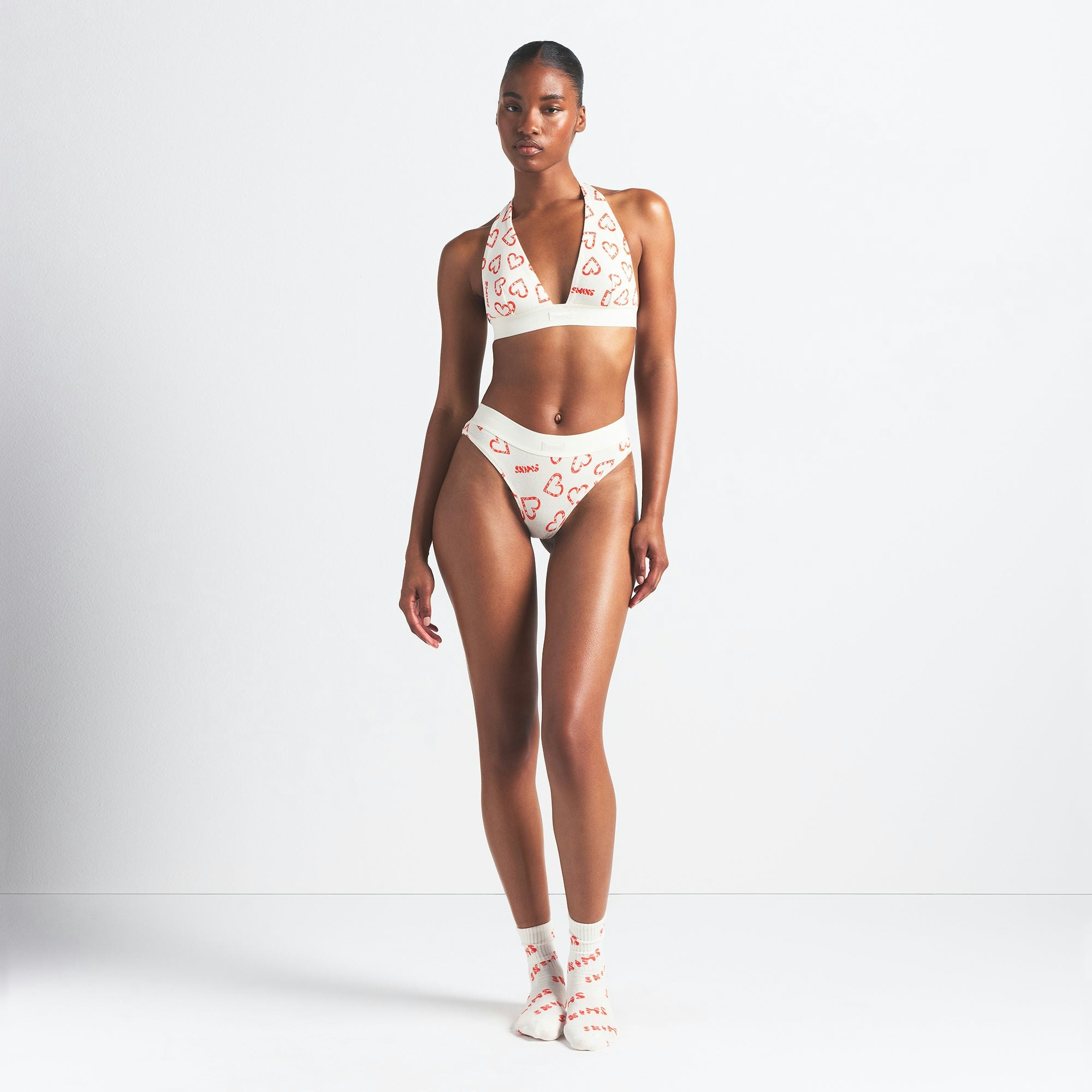 COTTON RIB HALTER BRALETTE | MARBLE CANDY HEART PRINT ON A MODEL FRONT VIEW @ | FOCUS: 0.0, 1.0, 0.9