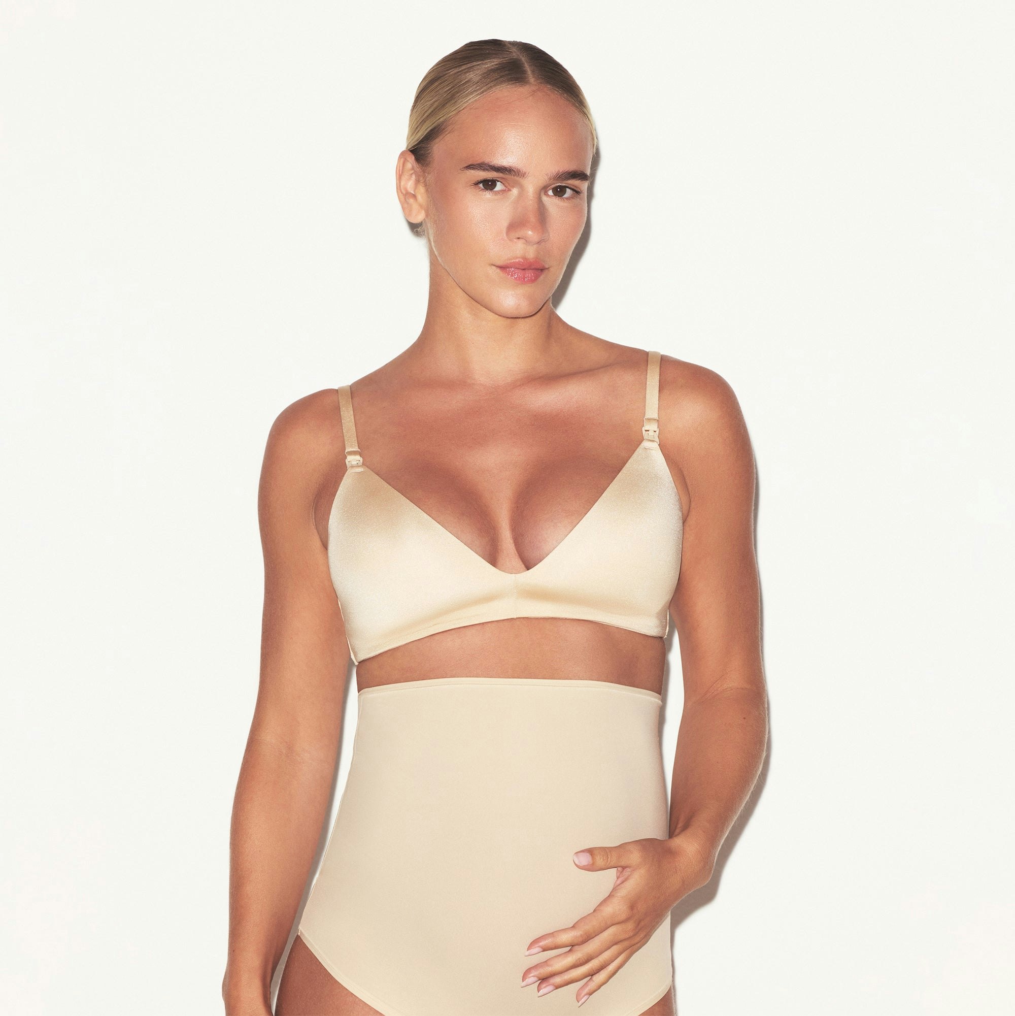 WIRELESS FORM MATERNITY NURSING BRA | SAND ON A MODEL SIDE VIEW @ | FOCUS: 0.0, 1.0, 0.9