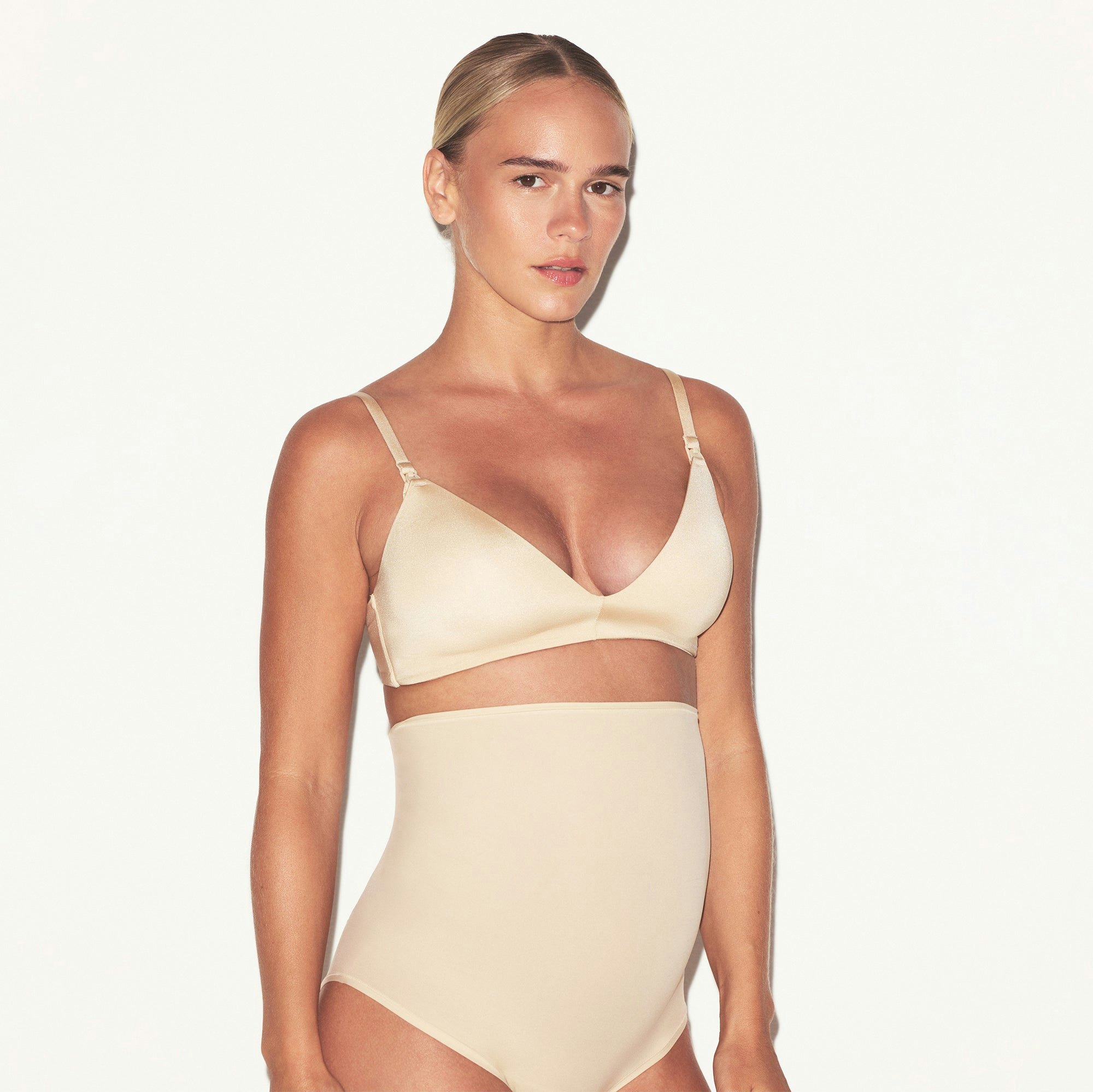 WIRELESS FORM MATERNITY NURSING BRA | SAND ON A MODEL SIDE VIEW @ | FOCUS: 0.0, 1.0, 0.9