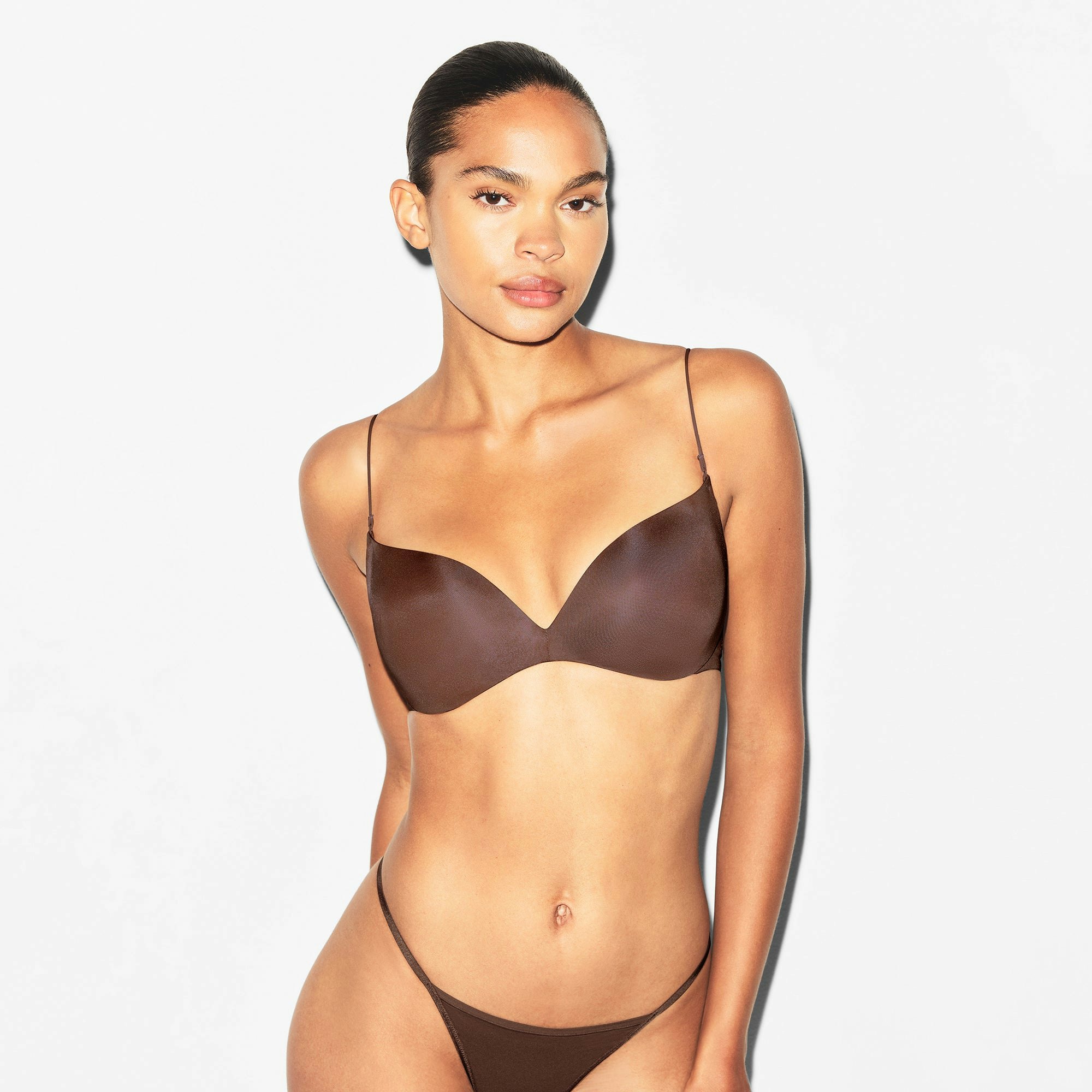 WIRELESS FORM PLUNGE MICRO STRAP BRA | COCOA ON A MODEL FRONT VIEW | FOCUS: 0.0, 1.0, 0.9