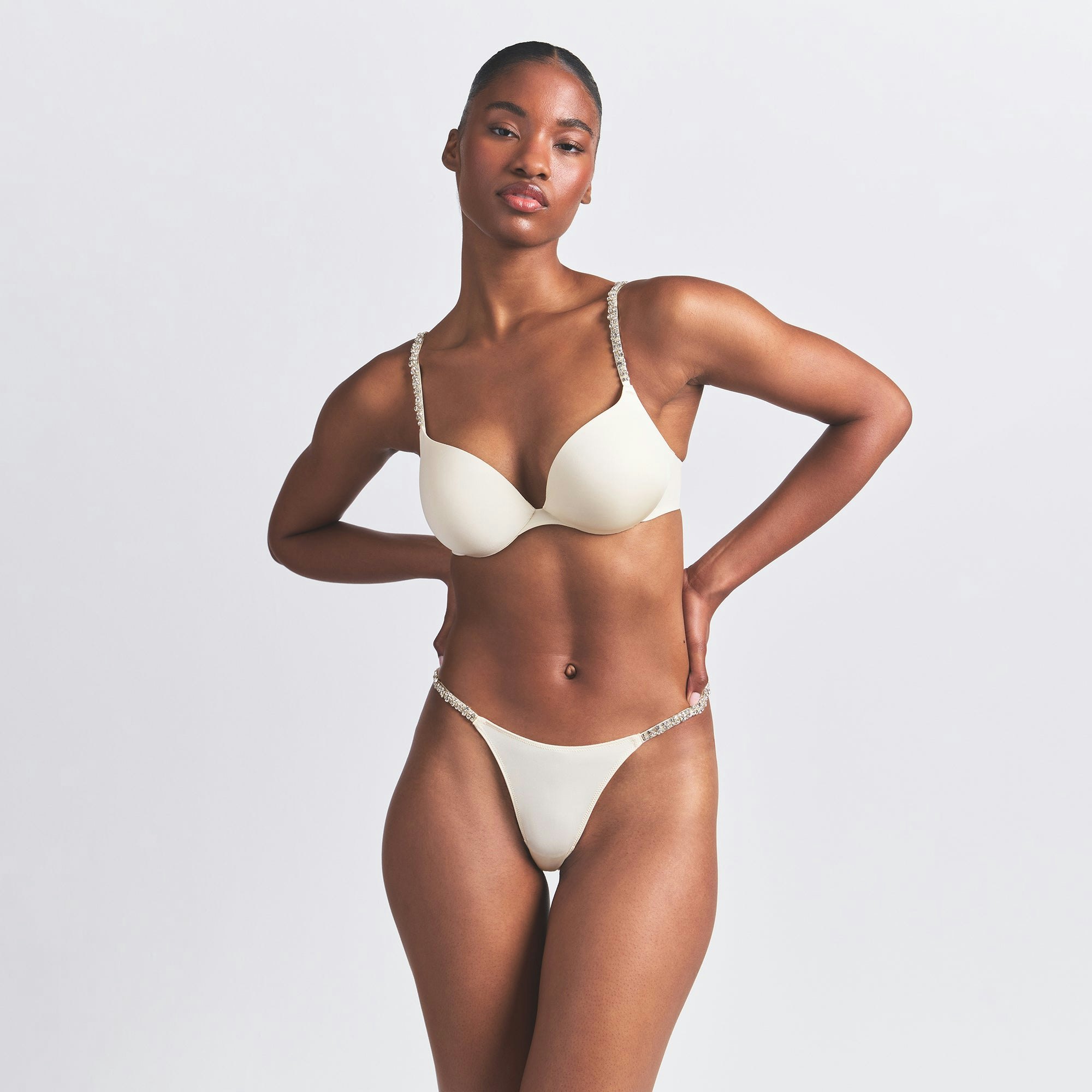 SKIMS ULTIMATE RHINESTONE TEARDROP PUSH-UP BRA | ECRU ON A MODEL FRONT VIEW @ | FOCUS: 0.0, 1.0, 0.9