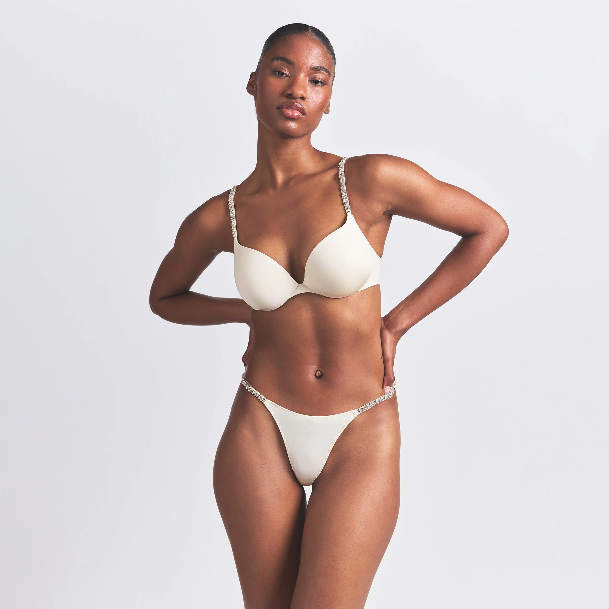 SKIMS ULTIMATE RHINESTONE TEARDROP PUSH-UP BRA | ECRU ON A MODEL FRONT VIEW @ | FOCUS: 0.0, 1.0, 0.9