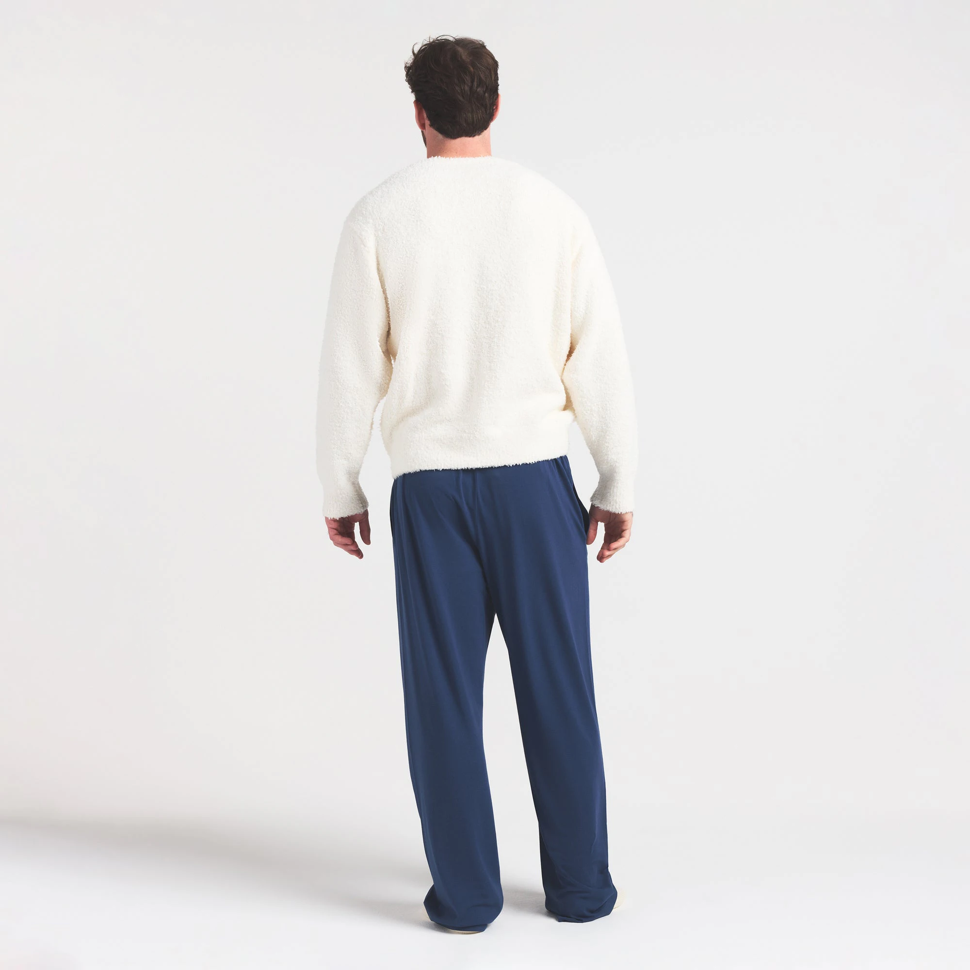 SKIMS FOR TEAM USA COZY UNISEX OLYMPIC SLEEP TOP | ECRU ON A MODEL FRONT VIEW @ | FOCUS: 0.0, 1.0, 0.9