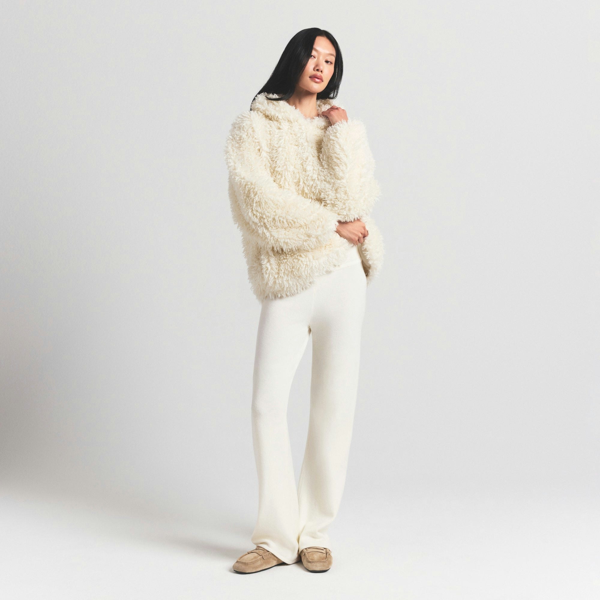 FAUX FUR HOODIE | EGRET ON A MODEL FRONT VIEW @ | FOCUS: 0.0, 1.0, 0.9