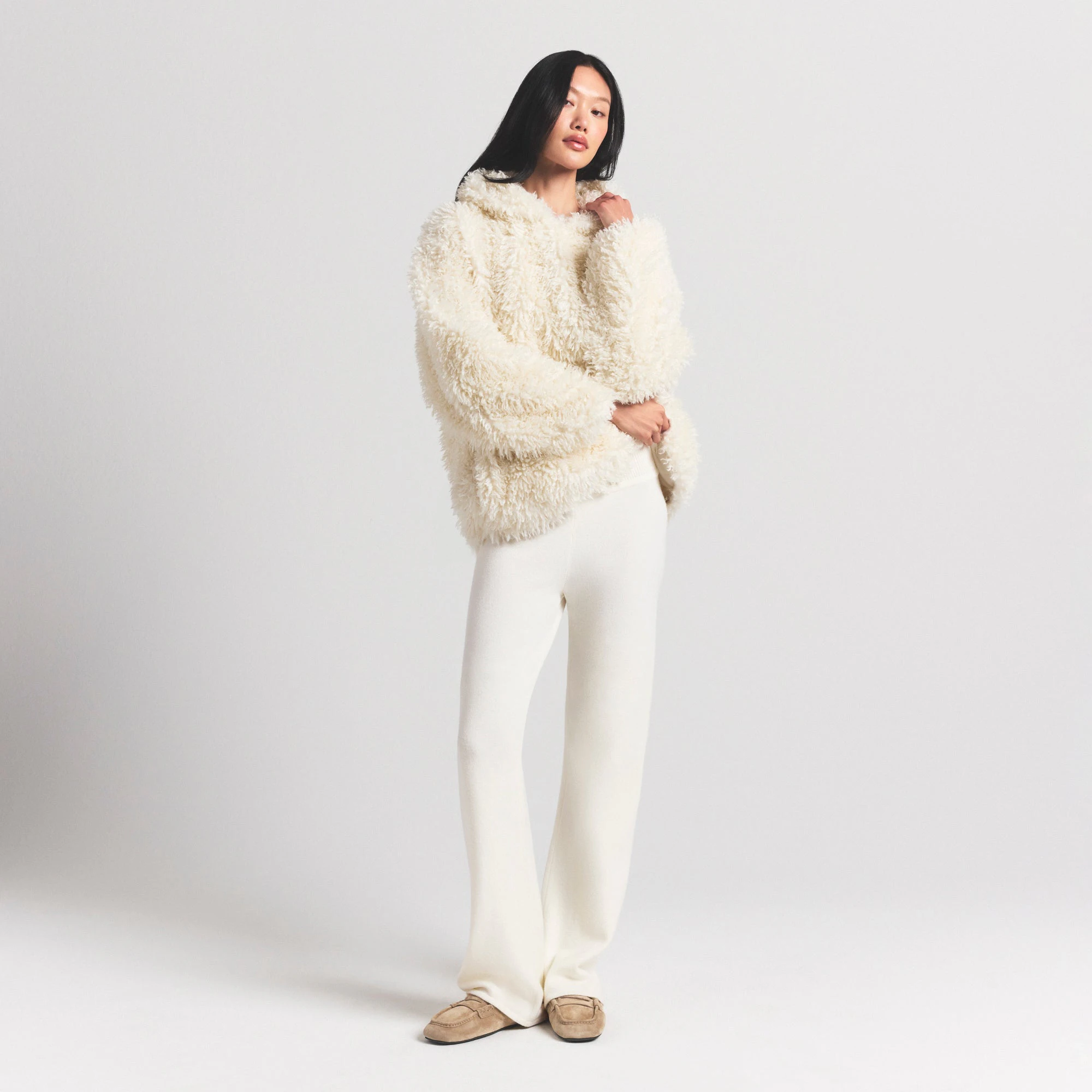 FAUX FUR HOODIE | EGRET ON A MODEL FRONT VIEW @ | FOCUS: 0.0, 1.0, 0.9