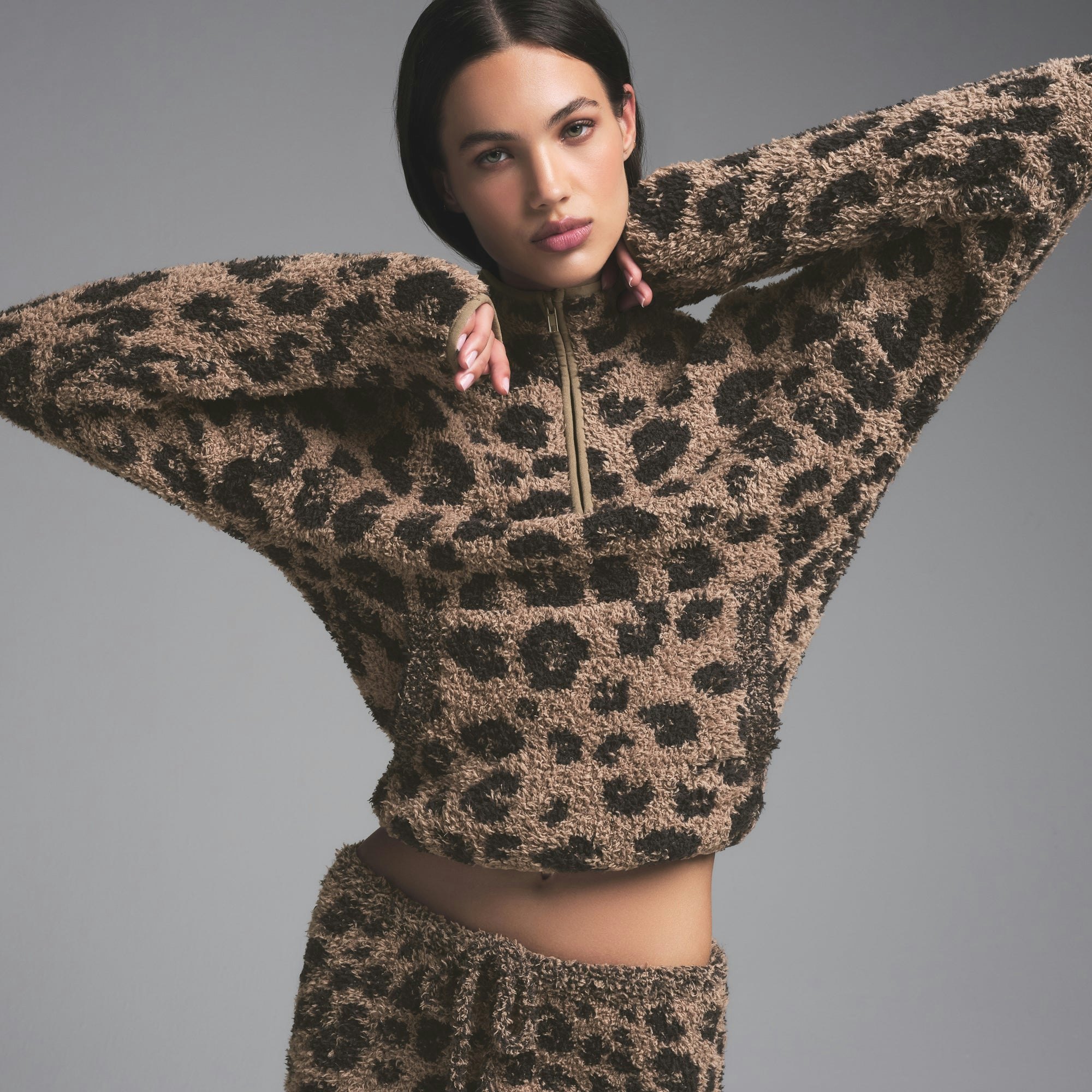 COZY KNIT UNISEX QUARTER ZIP PULLOVER | LEOPARD PRINT ON A MODEL SIDE VIEW