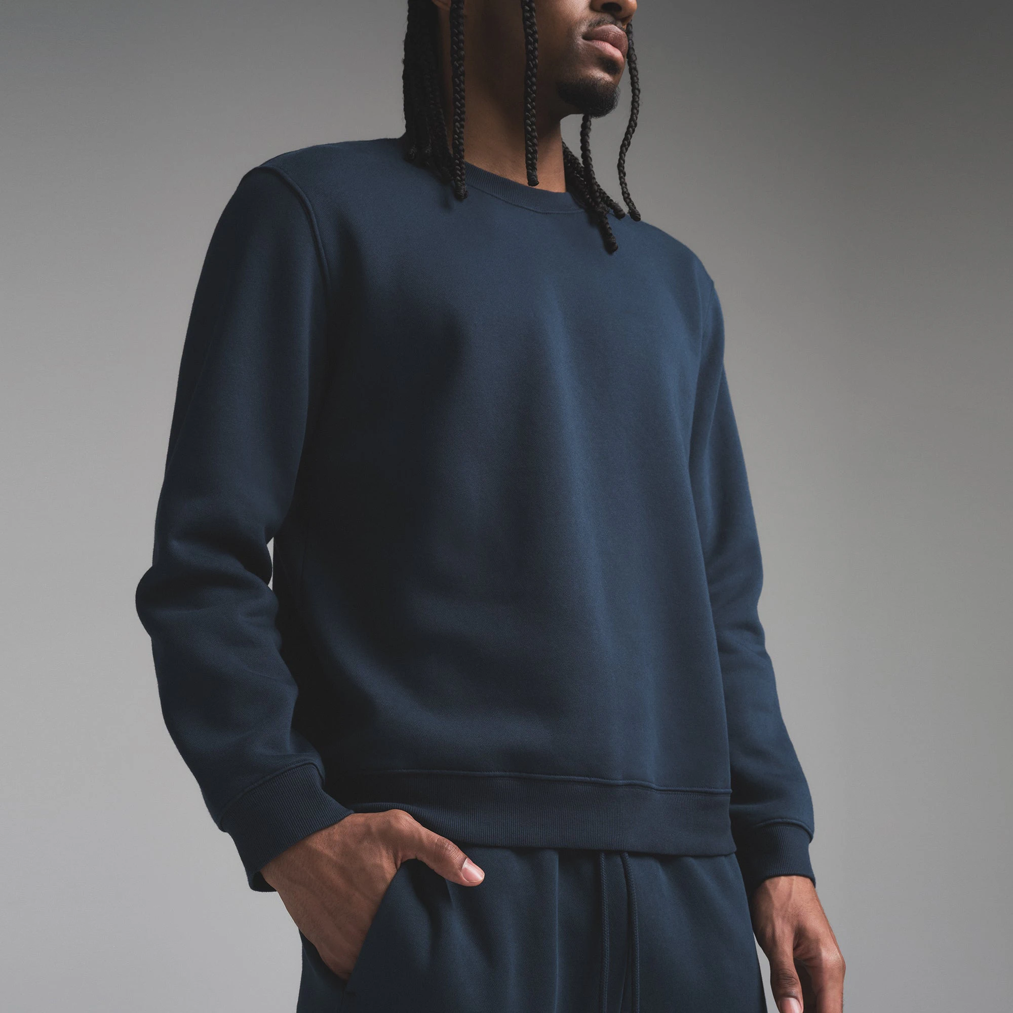 FLEECE LOUNGE MENS CLASSIC CREWNECK | NAVY ON A MODEL SIDE VIEW | FOCUS: 0.0, 1.0, 0.9 @ | FOCUS: 0.0, 1.0, 0.9