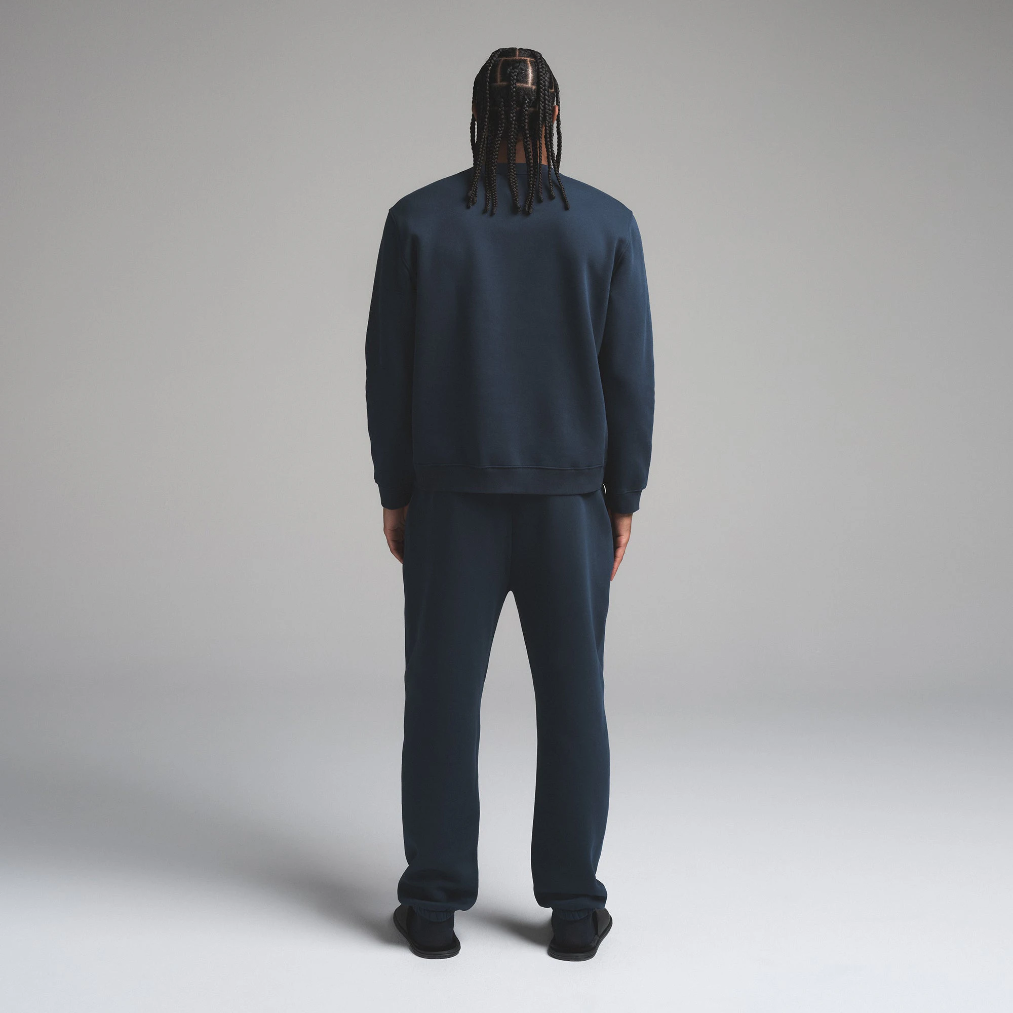 FLEECE LOUNGE MENS CLASSIC CREWNECK | NAVY ON A MODEL SIDE VIEW | FOCUS: 0.0, 1.0, 0.9 @ | FOCUS: 0.0, 1.0, 0.9