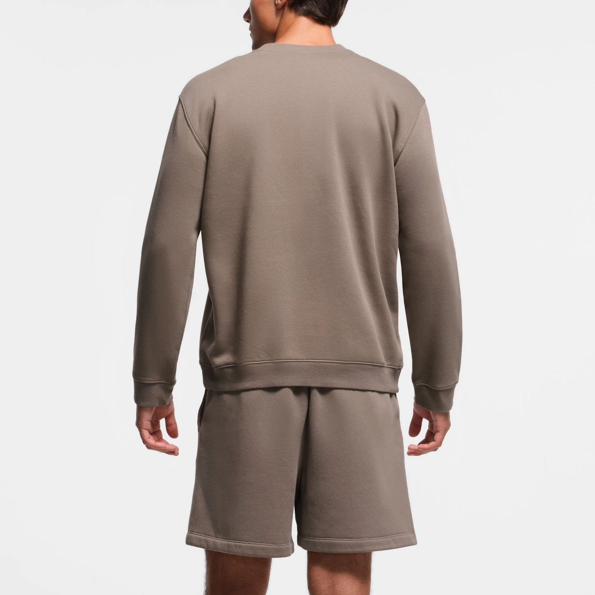 FLEECE LOUNGE MENS CLASSIC CREWNECK | TRUFFLE ON A MODEL BACK VIEW
