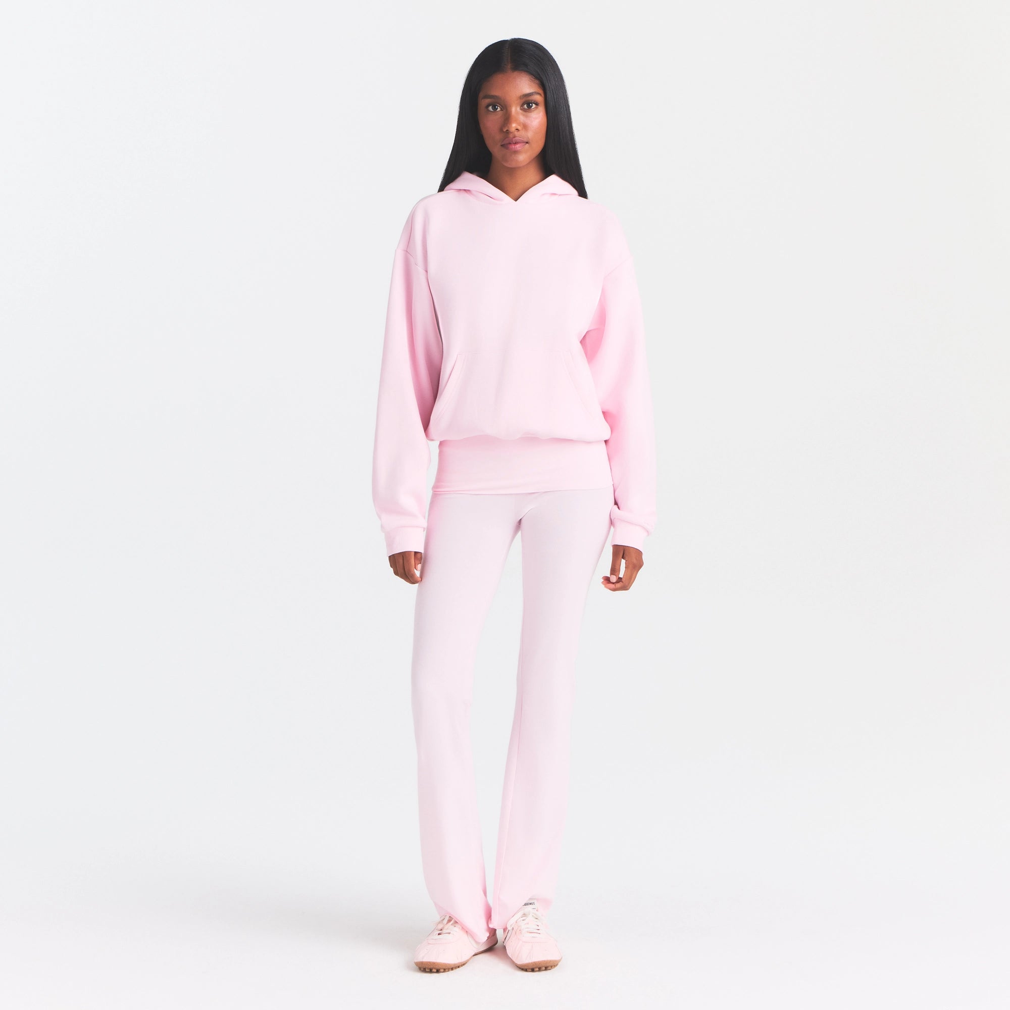 COTTON FLEECE CLASSIC HOODIE | CHERRY BLOSSOM ON A MODEL FRONT VIEW @ | FOCUS: 0.0, 1.0, 0.9