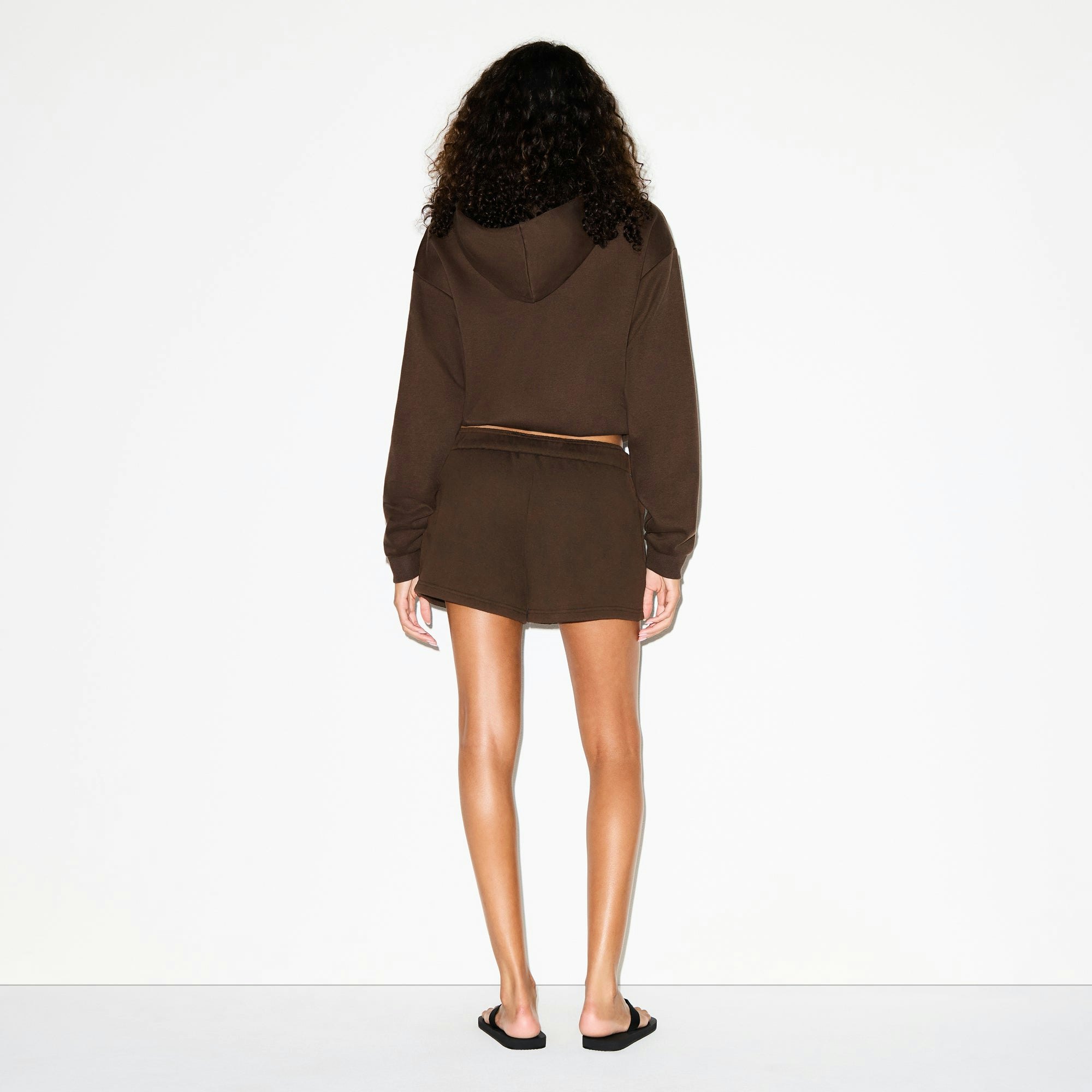 COTTON FLEECE CLASSIC HOODIE | DARK SEPIA ON A MODEL FRONT VIEW @ | FOCUS: 0.0, 1.0, 0.9