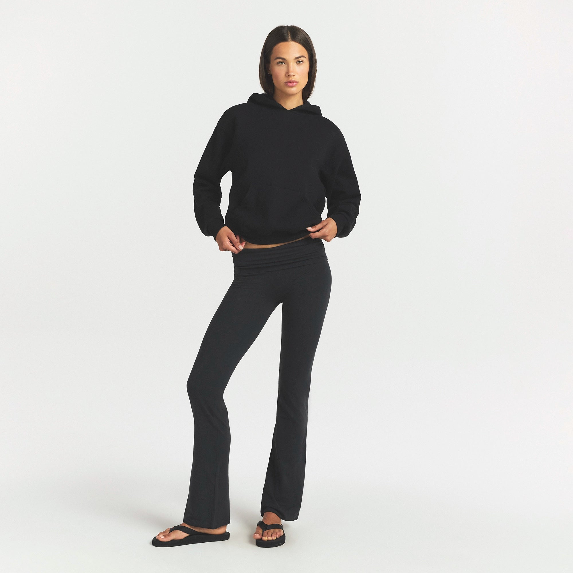 COTTON FLEECE CLASSIC HOODIE | ONYX ON A MODEL FRONT VIEW @ | FOCUS: 0.0, 1.0, 0.9