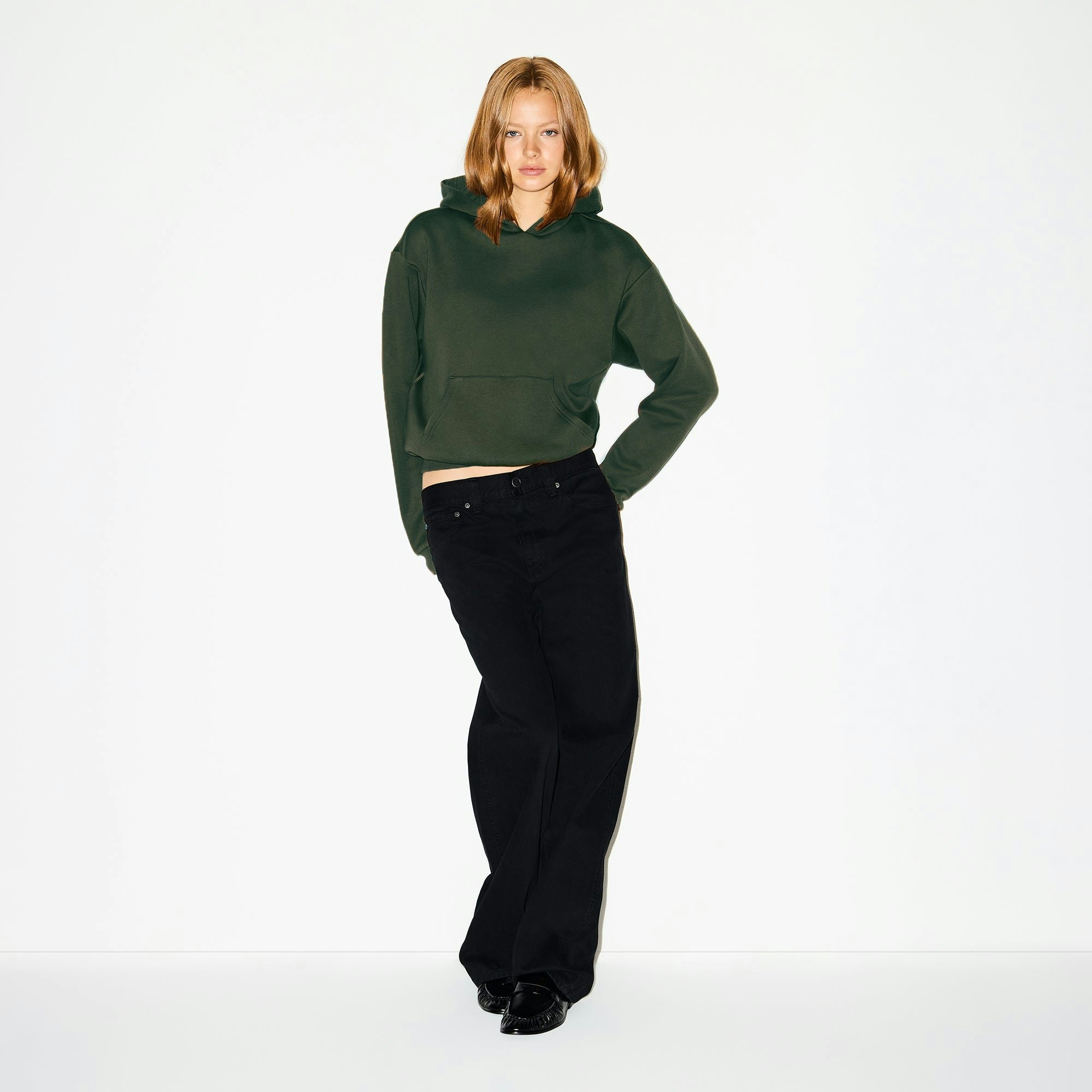 COTTON FLEECE CLASSIC HOODIE | SPRUCE ON A MODEL FRONT VIEW @ | FOCUS: 0.0, 1.0, 0.9