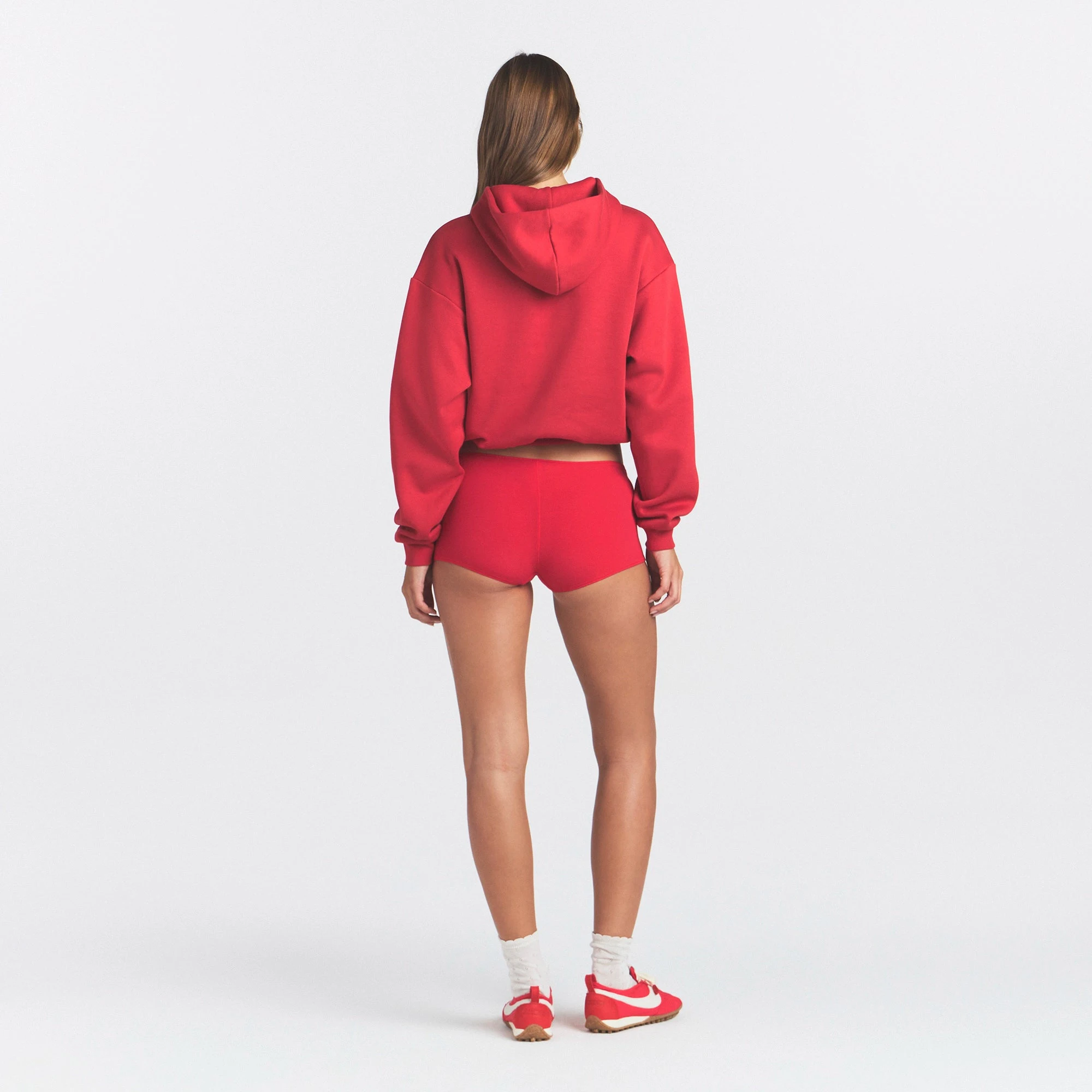 COTTON FLEECE CLASSIC HOODIE | WASHED RED ON A MODEL SIDE VIEW @ | FOCUS: 0.0, 1.0, 0.9