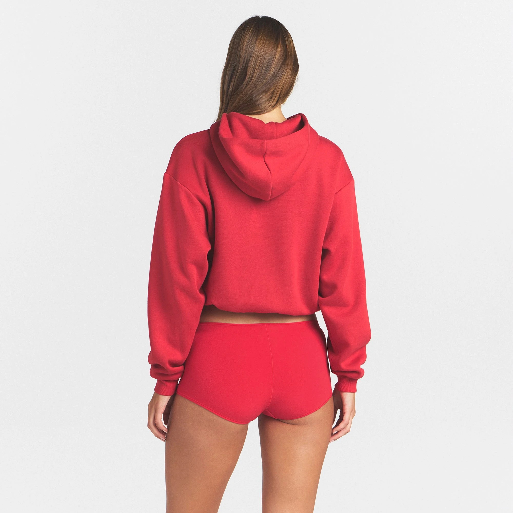 COTTON FLEECE CLASSIC HOODIE | WASHED RED ON A MODEL SIDE VIEW @ | FOCUS: 0.0, 1.0, 0.9