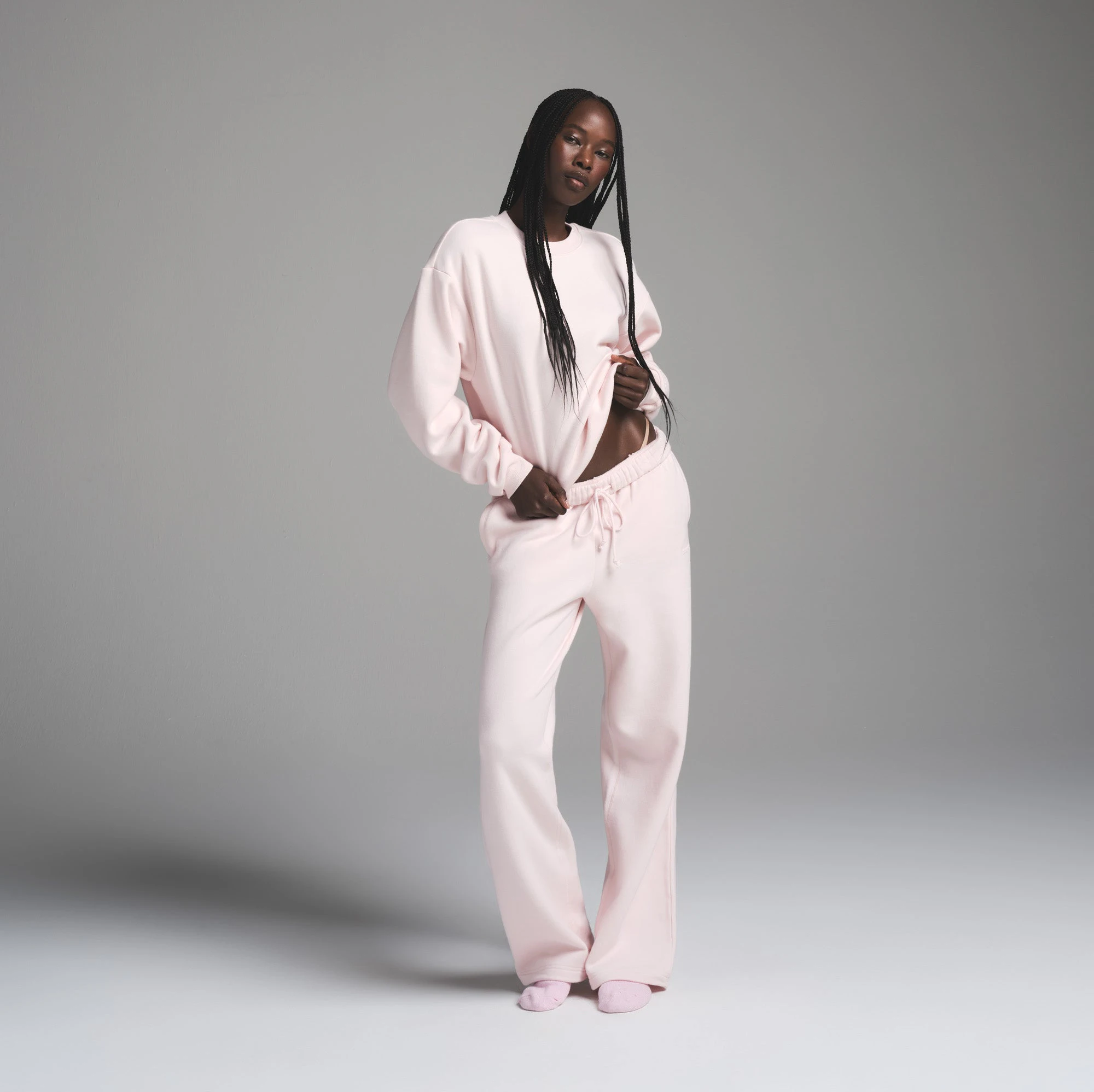 COTTON FLEECE CLASSIC CREWNECK | BARELY PINK ON A MODEL FRONT VIEW | FOCUS: 0.0, 1.0, 0.9