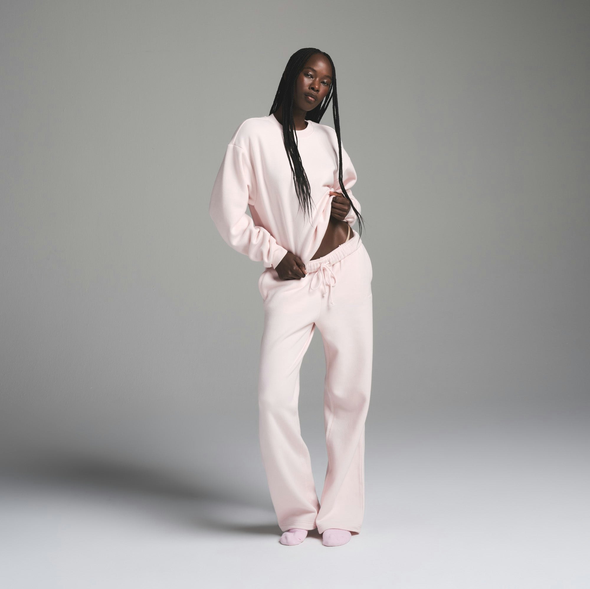 COTTON FLEECE CLASSIC CREWNECK | BARELY PINK ON A MODEL FRONT VIEW | FOCUS: 0.0, 1.0, 0.9