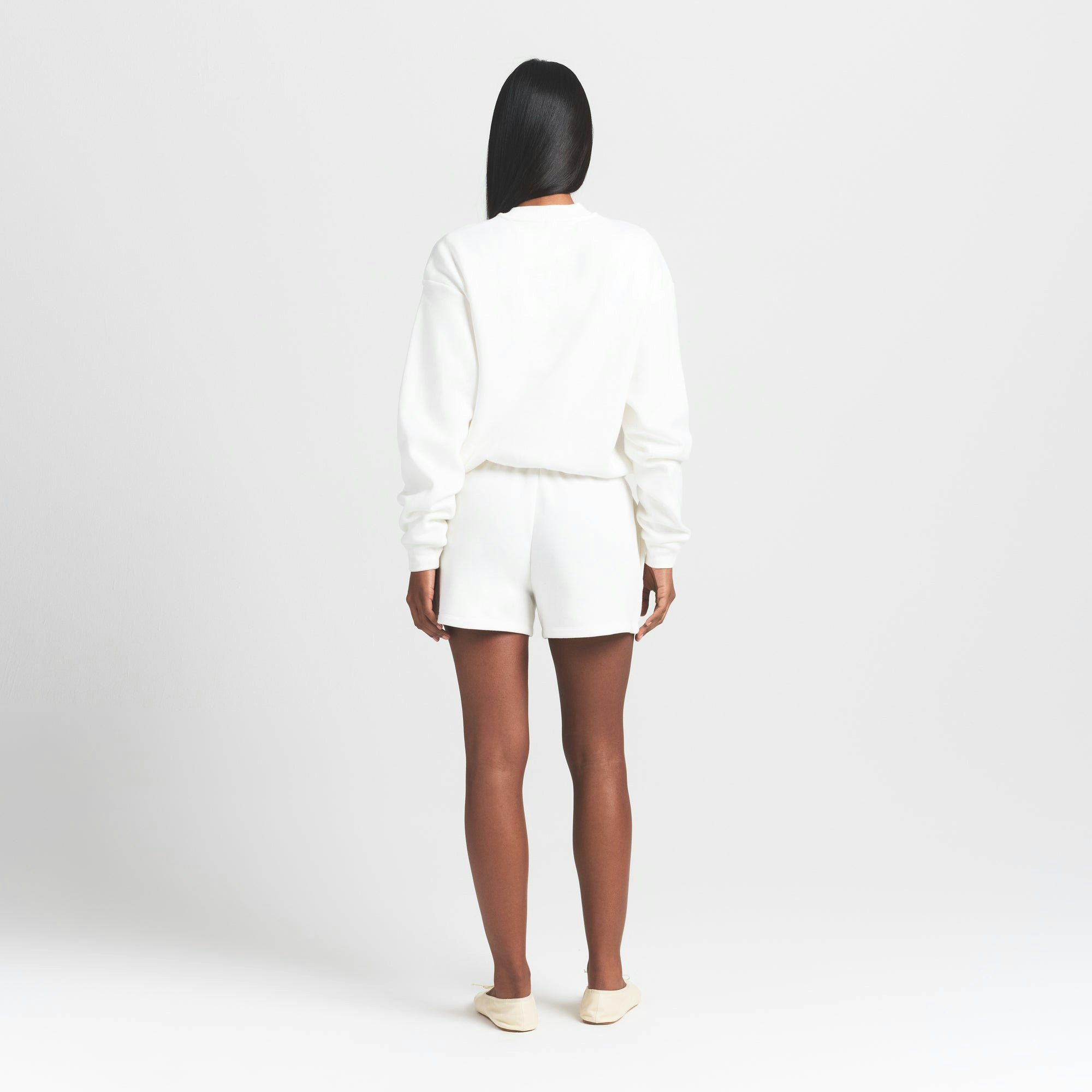 COTTON FLEECE CLASSIC CREWNECK | MARBLE ON A MODEL BACK VIEW @ | FOCUS: 0.9, 0.1, 0.7