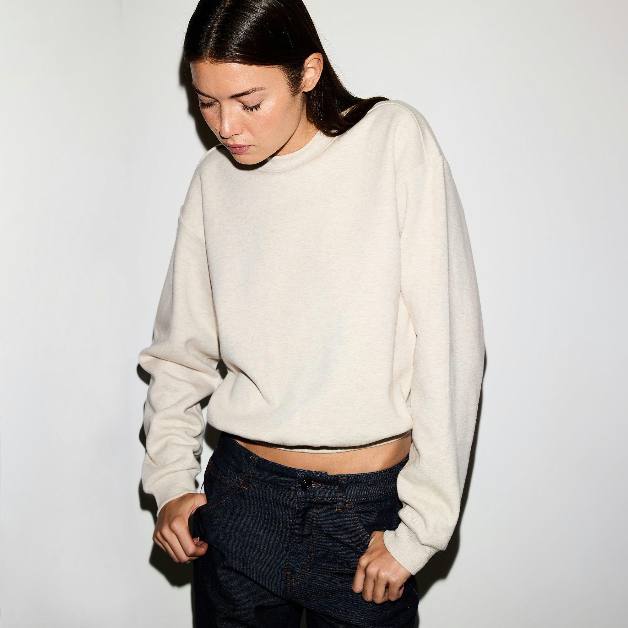 COTTON FLEECE CLASSIC CREWNECK | OATMEAL HEATHER ON A MODEL FRONT VIEW @ | FOCUS: 0.0, 1.0, 0.9